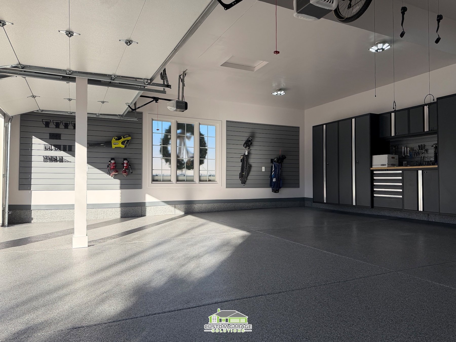 Clean, organized suburban garage designed for busy family schedules