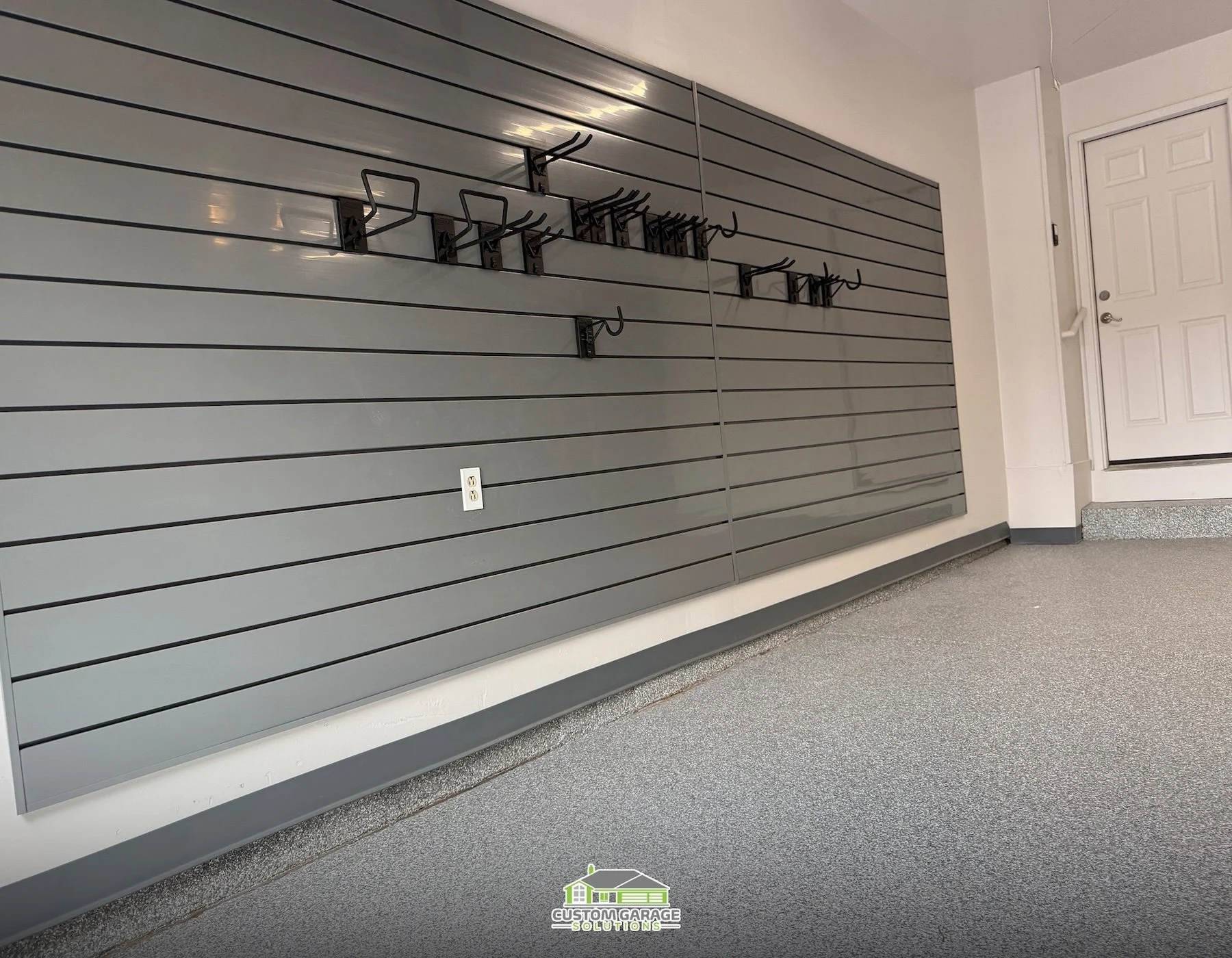 Colorado family garage transformed for baseball, softball, lacrosse, soccer, golf, and track storage