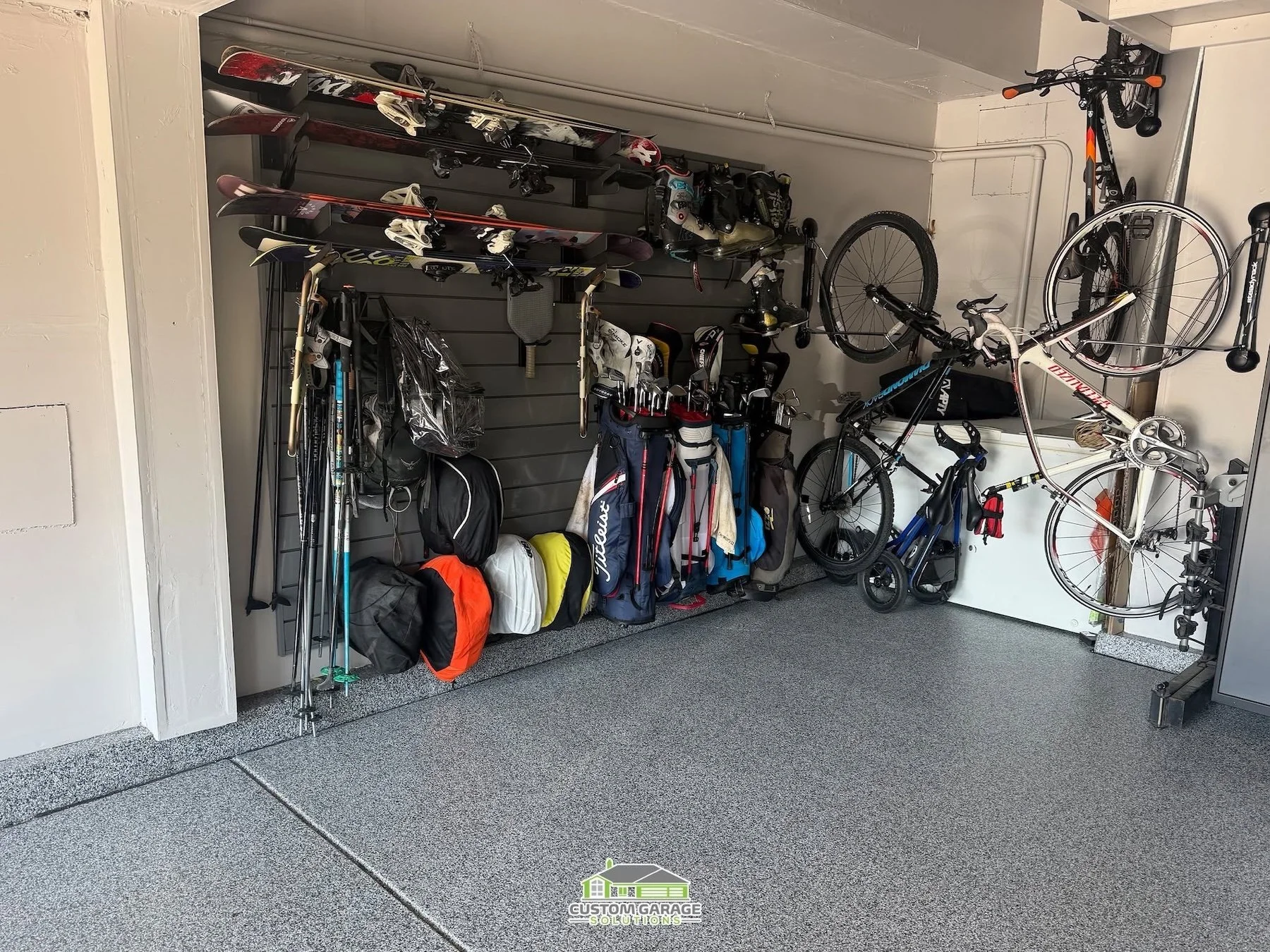 Thoughtfully planned Colorado garage with dedicated zones for everyday activities