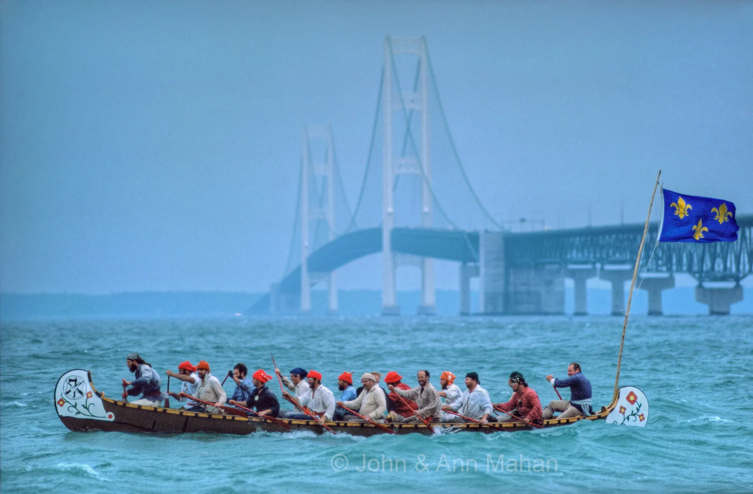 ID_13-2136B   Voyageur Canoe Historic Reenactment with Mackinac Bridge beyond