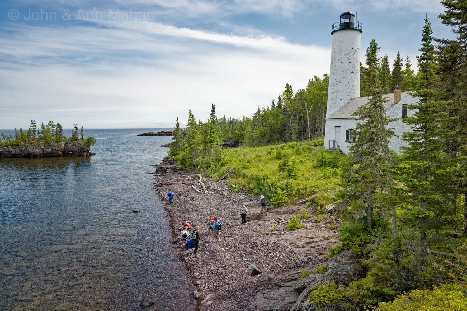 Exploring the shore and rockhunting at Rock Harbor Lighthouse