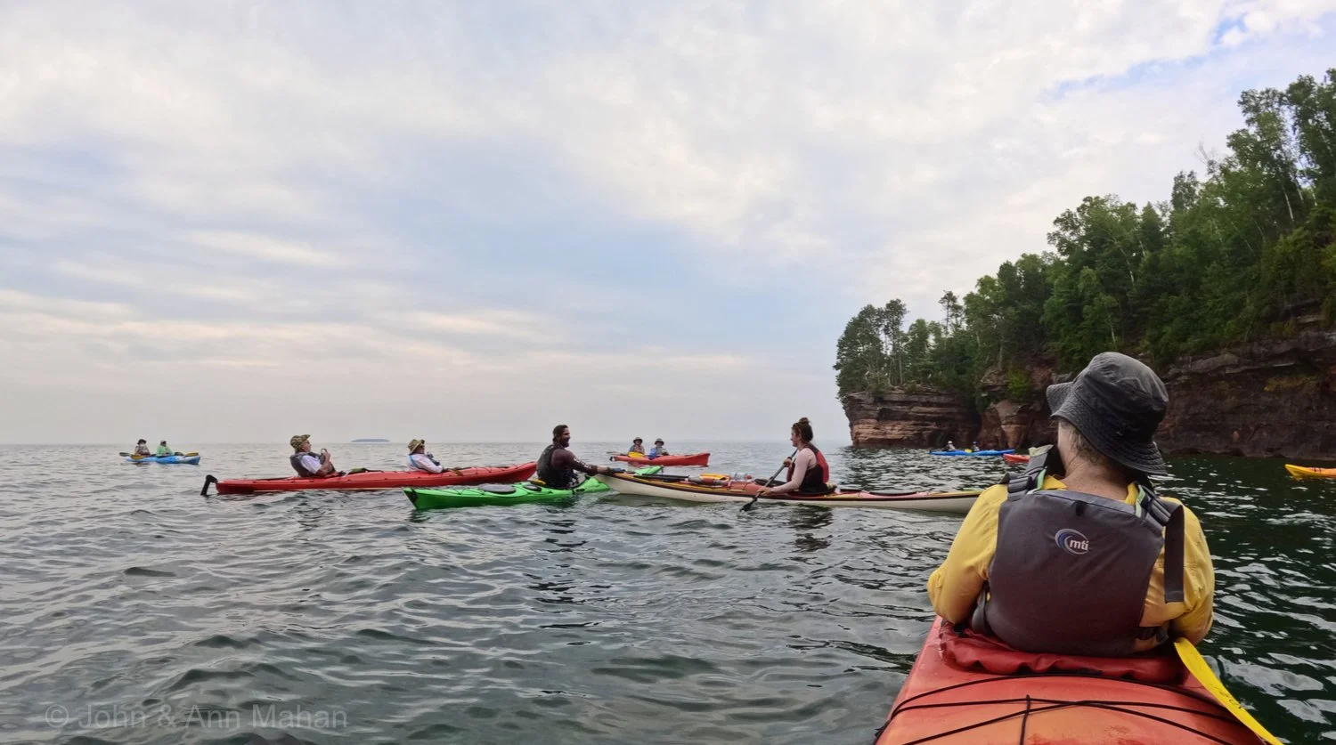 Kayakers with Lost Creek Adventures Guides, at Sea Cave Cliffs