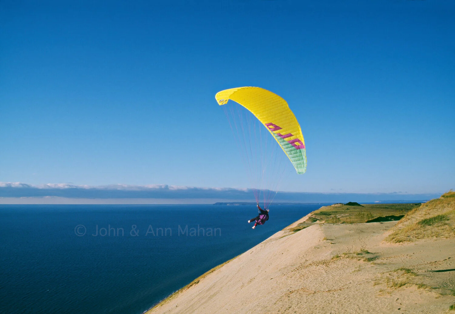 ID_25-7117C   Paraglider above Sleeping Bear Dunes -- Manitou Islands on Horizon