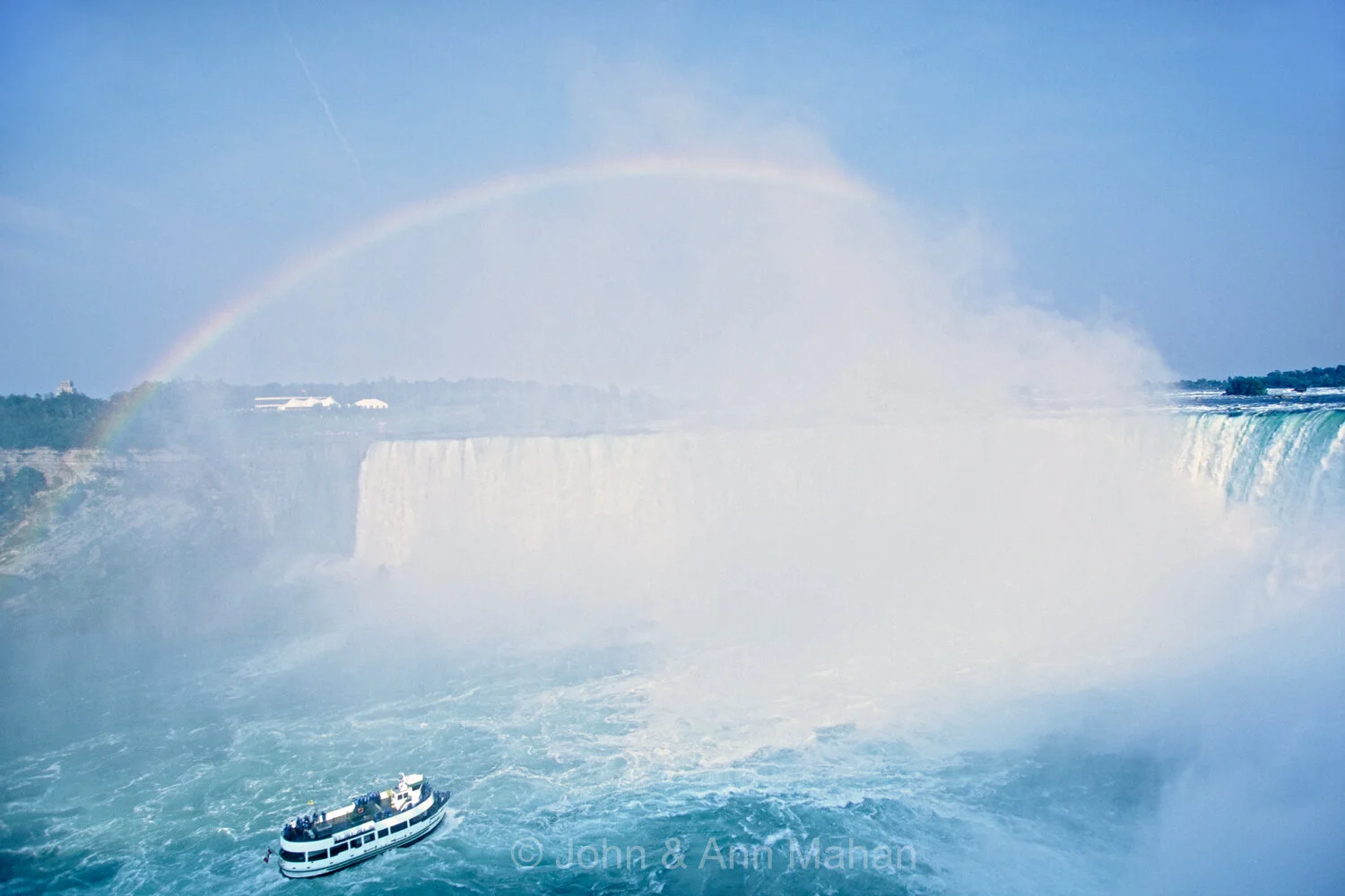 ID_32-7979C Tour Boat and Rainbow at Niagara Falls -- on Niagara River that connects Lake Erie and Lake Ontario