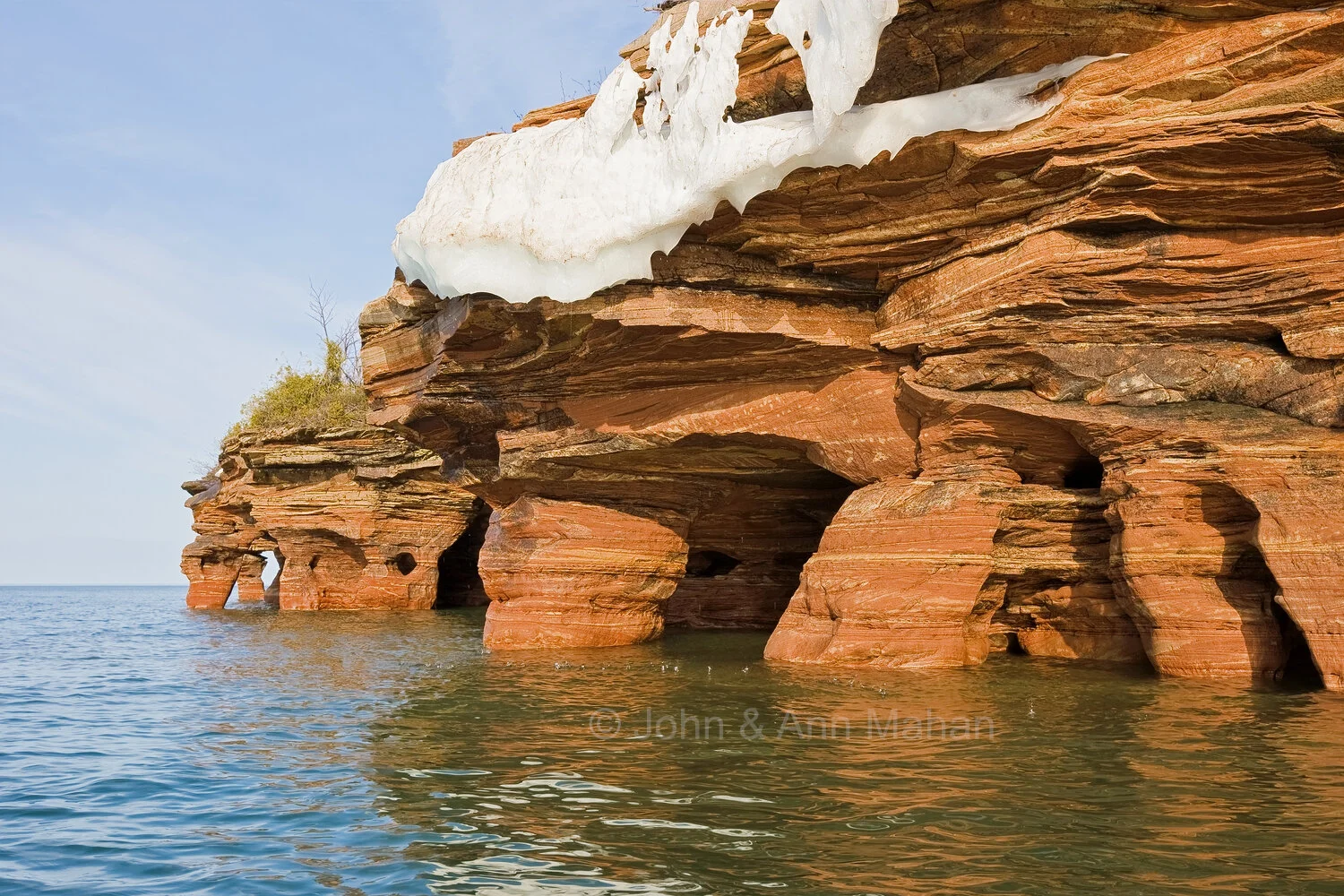 ID_8800-2C4_08 Devils Island Sea Caves with Snow remaining on Cliffs in Spring