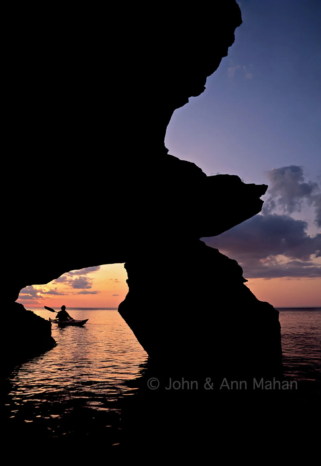 ID_14-5707B Sea Kayaking at Sunset at Mawikwe Bay Sea Caves