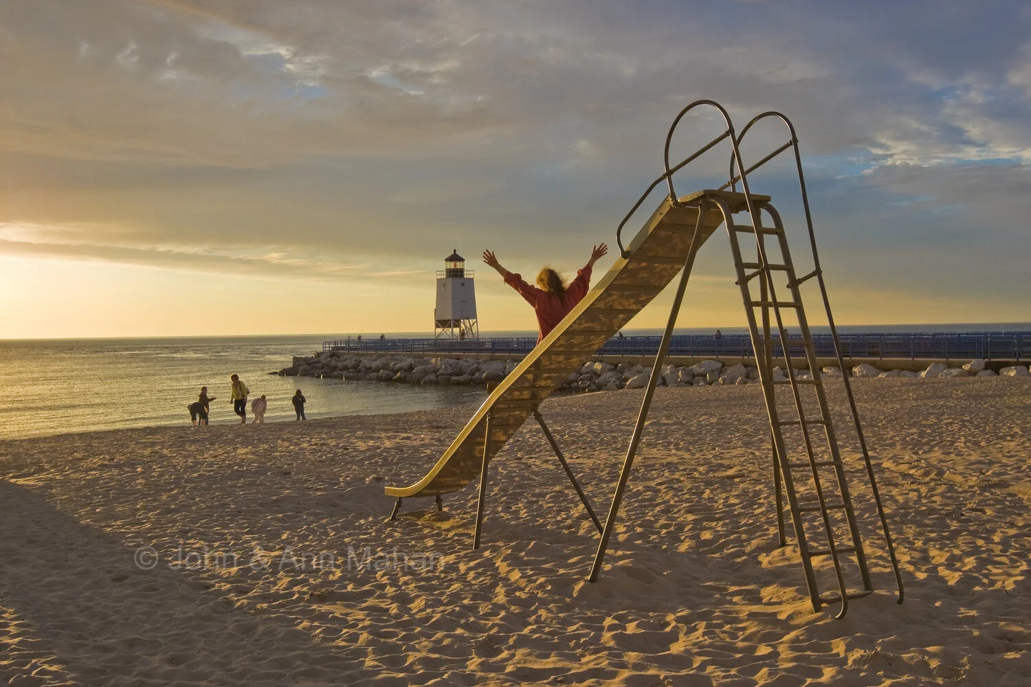 ID_2076C4_08 Playground at beach with Charlevoix South Pier Light beyond