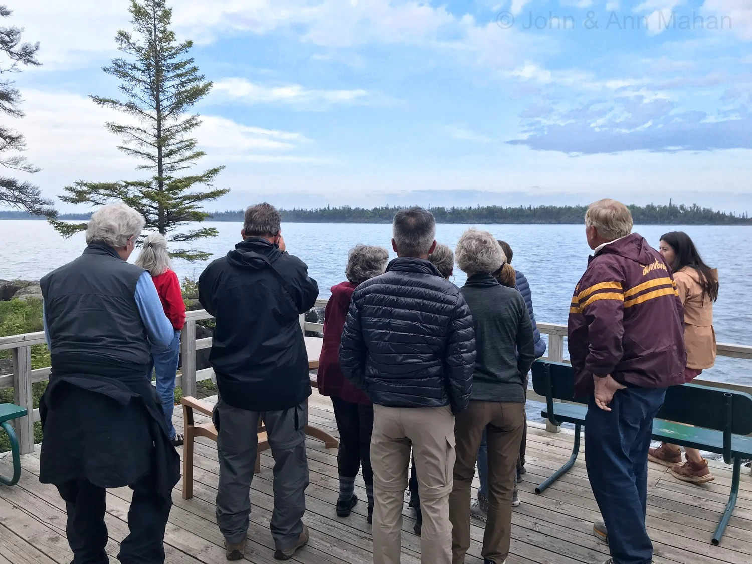 Watching a moose swimming from Raspberry Island -- Rock Harbor Lodge Guest House Deck