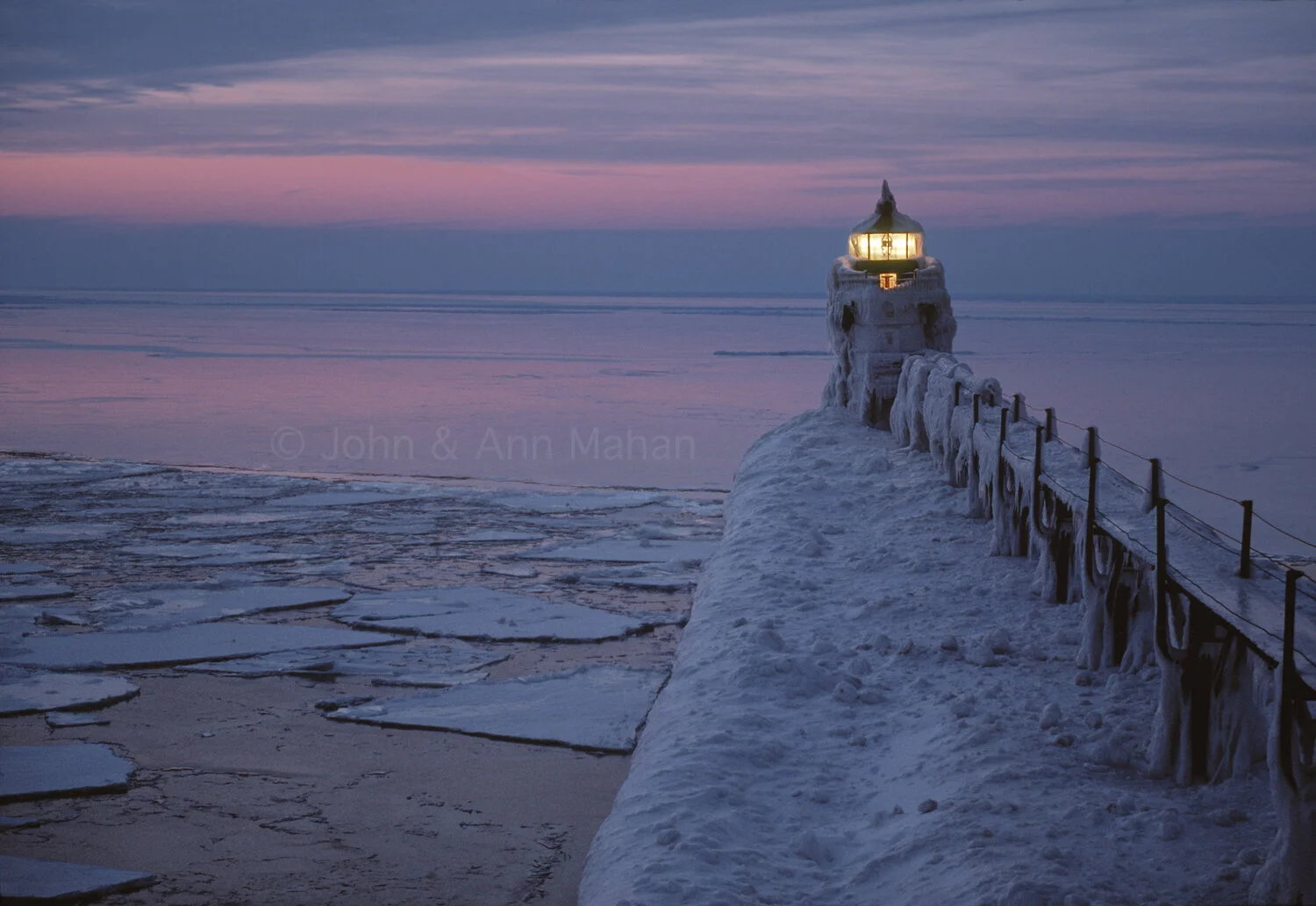 ID_36-287C Ice-encased St Joseph North Pierhead Light after sunset
