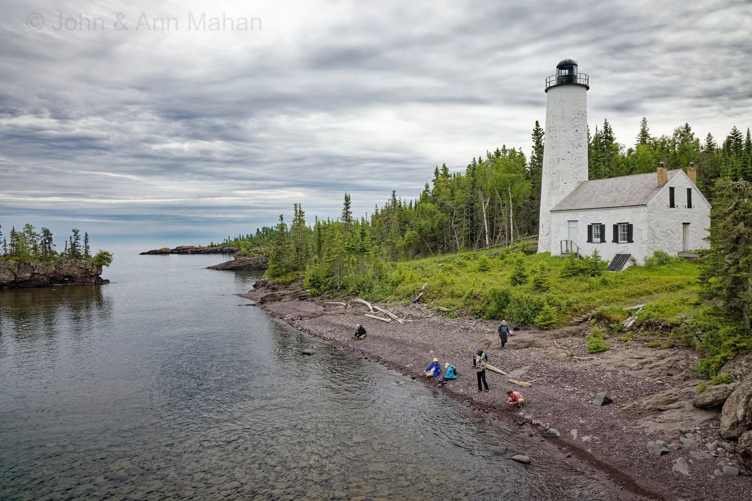 Exploring the shore and rockhunting at Rock Harbor Lighthouse