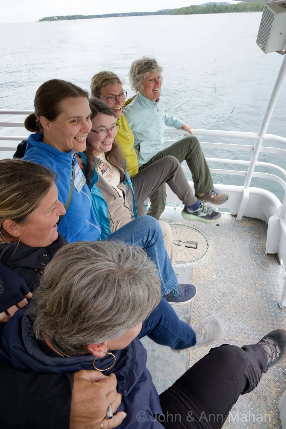 On board Isle Royale Queen Ferry, on arrival in Copper Harbor -- Dancing the Can-Can as we pass Harbor Haus Restaurant, where the wait staff was dancing to greet our ferry