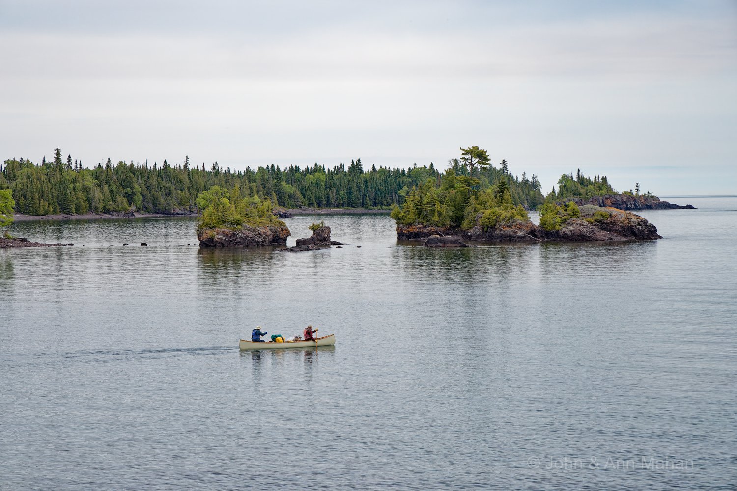 Rolf and Candy Peterson leaving on canoe trip to circumnavigate Isle Royale