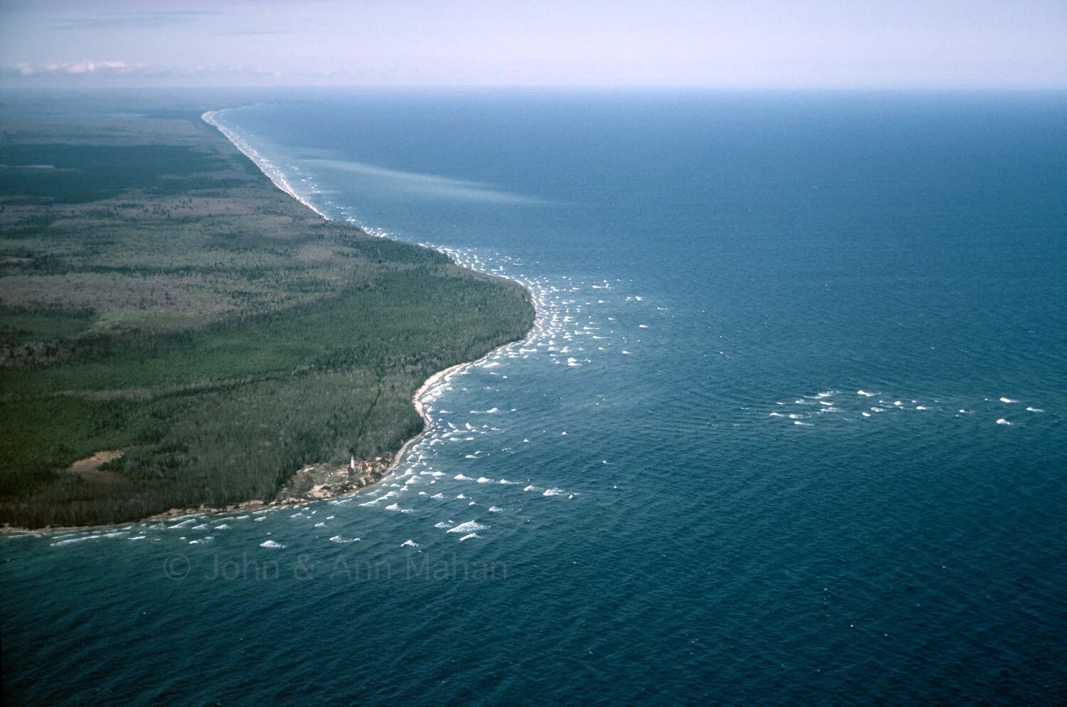 ID_1-774C Aerial view of Au Sable Point with waves breaking over shoals -- called the Graveyard Coast -- Pictured Rocks National Lakeshore