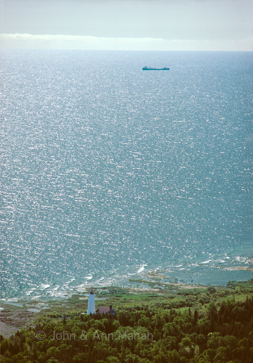 ID_21-806C   Aerial view of Thunder Bay Island Lighthouse -- Lake Freighter in distance