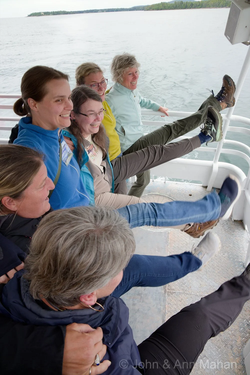 On board Isle Royale Queen Ferry, on arrival in Copper Harbor -- Dancing the Can-Can as we pass Harbor Haus Restaurant, where the wait staff was dancing to greet our ferry