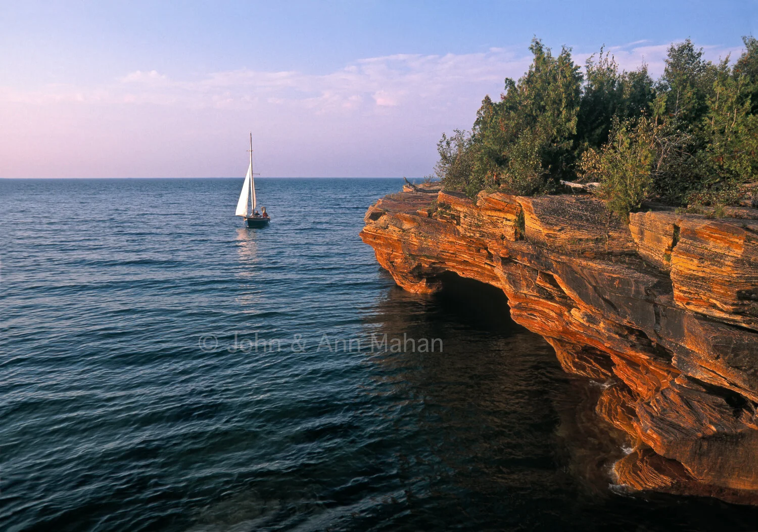 ID_28-7074C  Sailboat at Devils Island Sea Caves