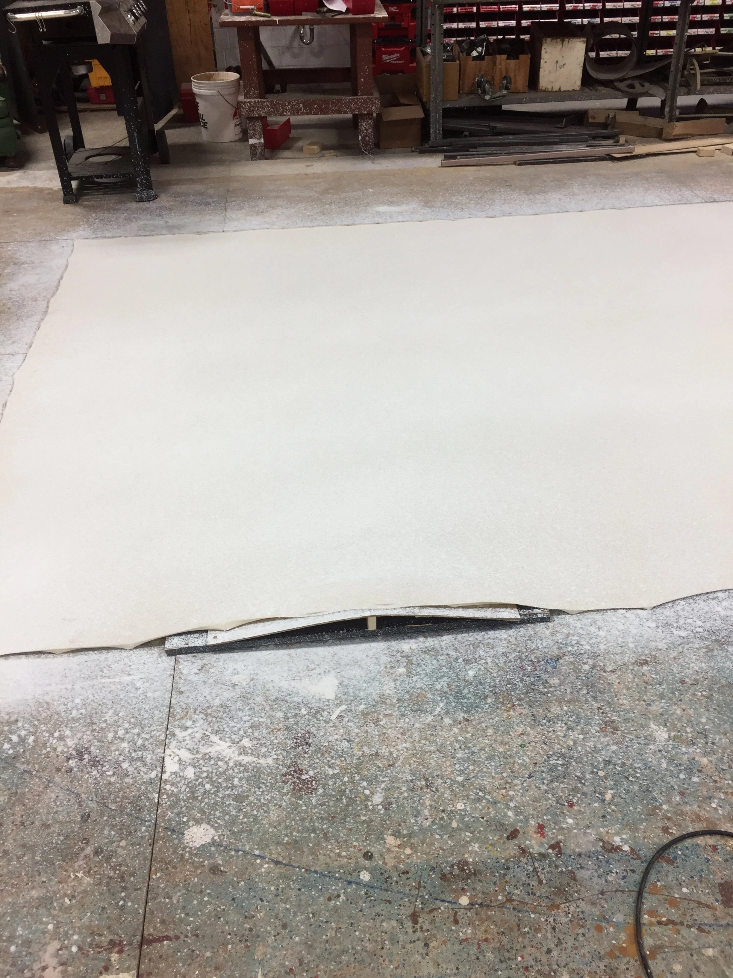 The bridge underneath a prepared drop - (Pythagorean Theorem for 90 degree angles, sized w/ water-cornstarch mixture, gridded with twine)