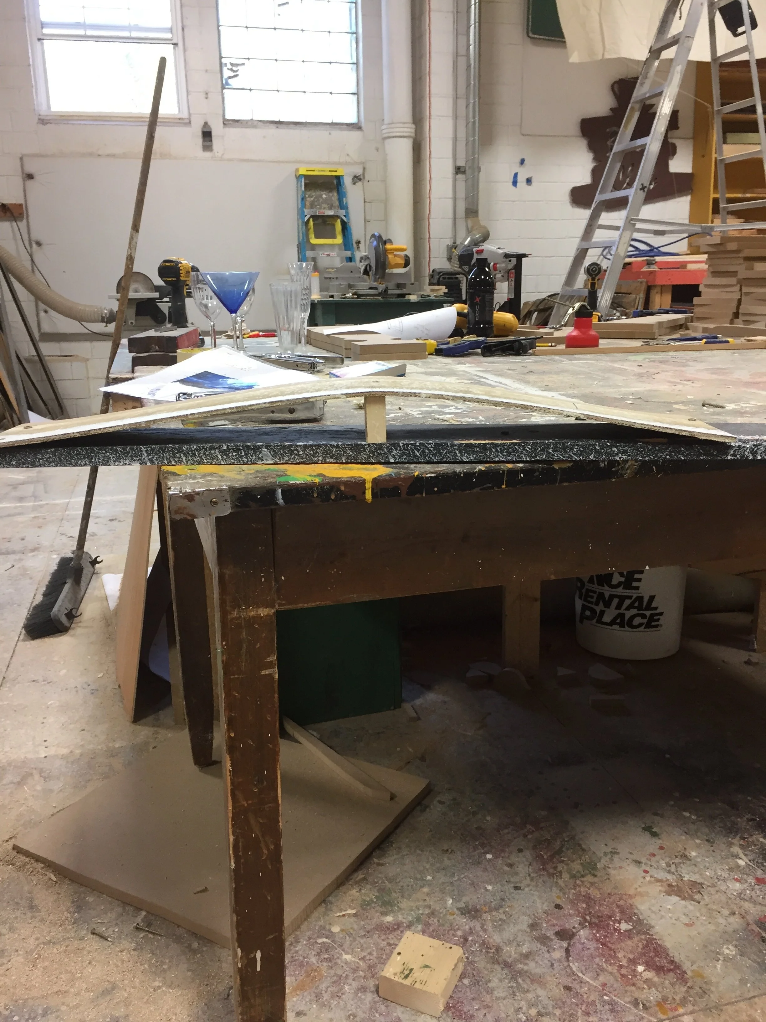 Constructing a paint bridge to float drops for drying