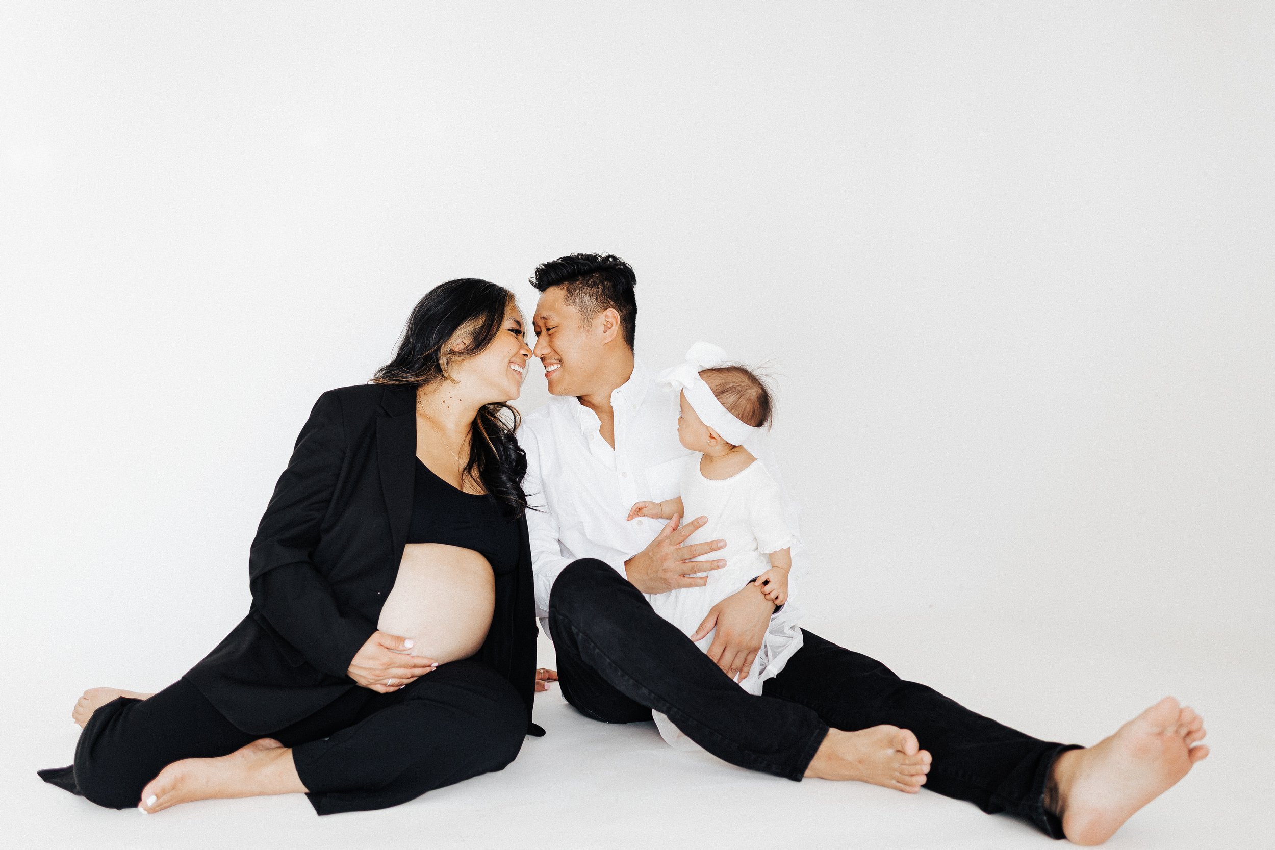 Soft and timeless in-studio motherhood and family session at Marisabel Studio in Anchorage, Alaska featuring a clean white backdrop and natural light. Perfect for capturing connection, emotion, and the simple beauty of your family.