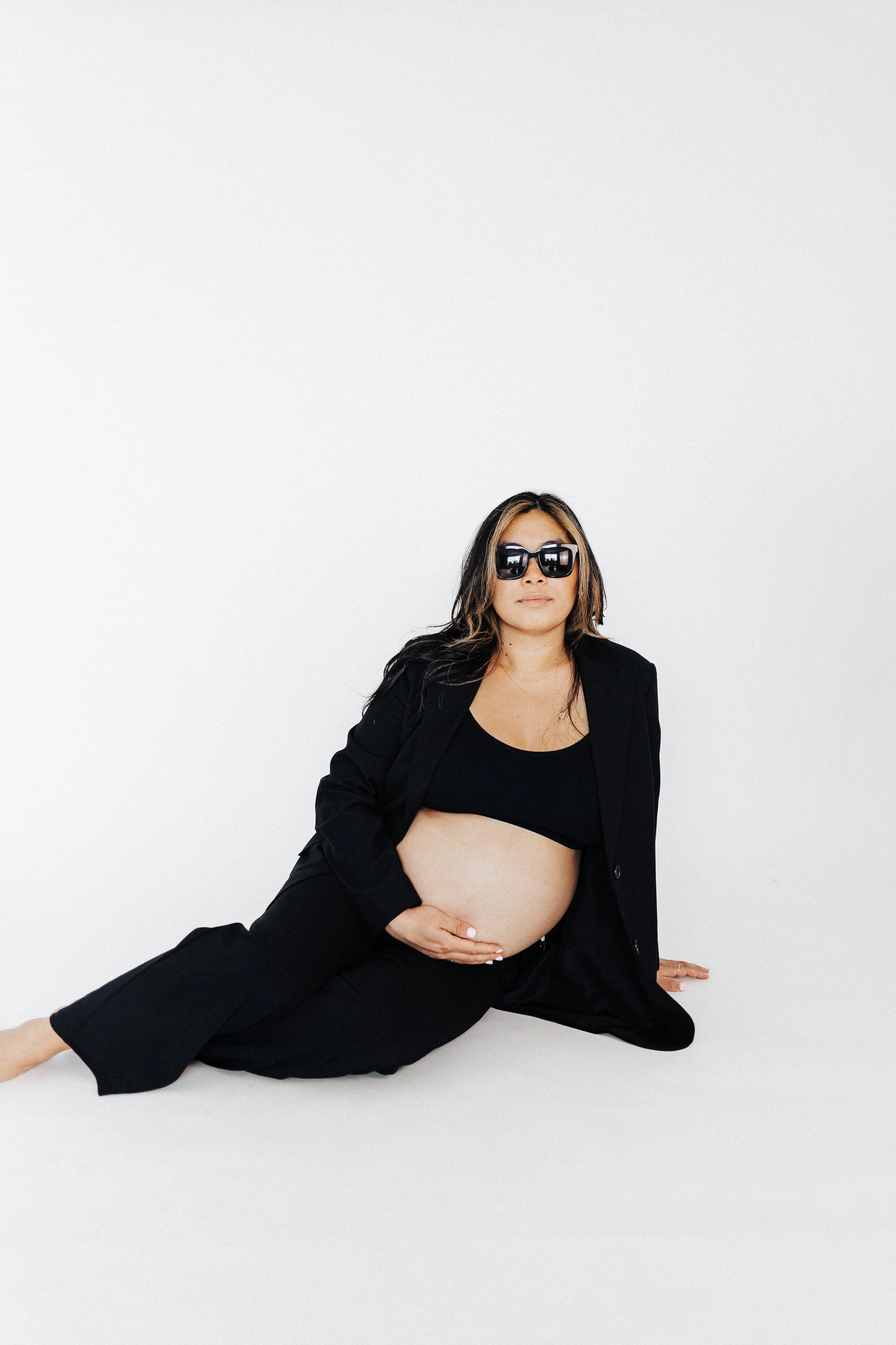 Soft and timeless in-studio motherhood and family session at Marisabel Studio in Anchorage, Alaska featuring a clean white backdrop and natural light. Perfect for capturing connection, emotion, and the simple beauty of your family.