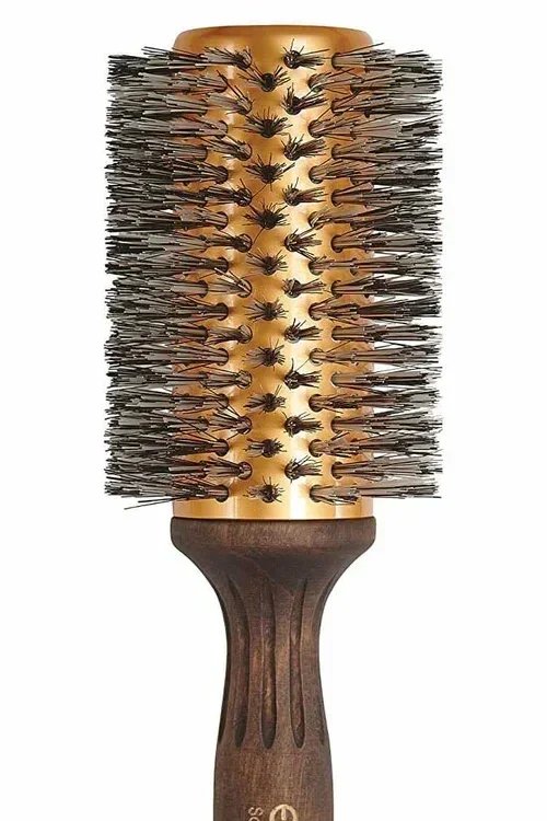 Close up of round brush with boar bristles.