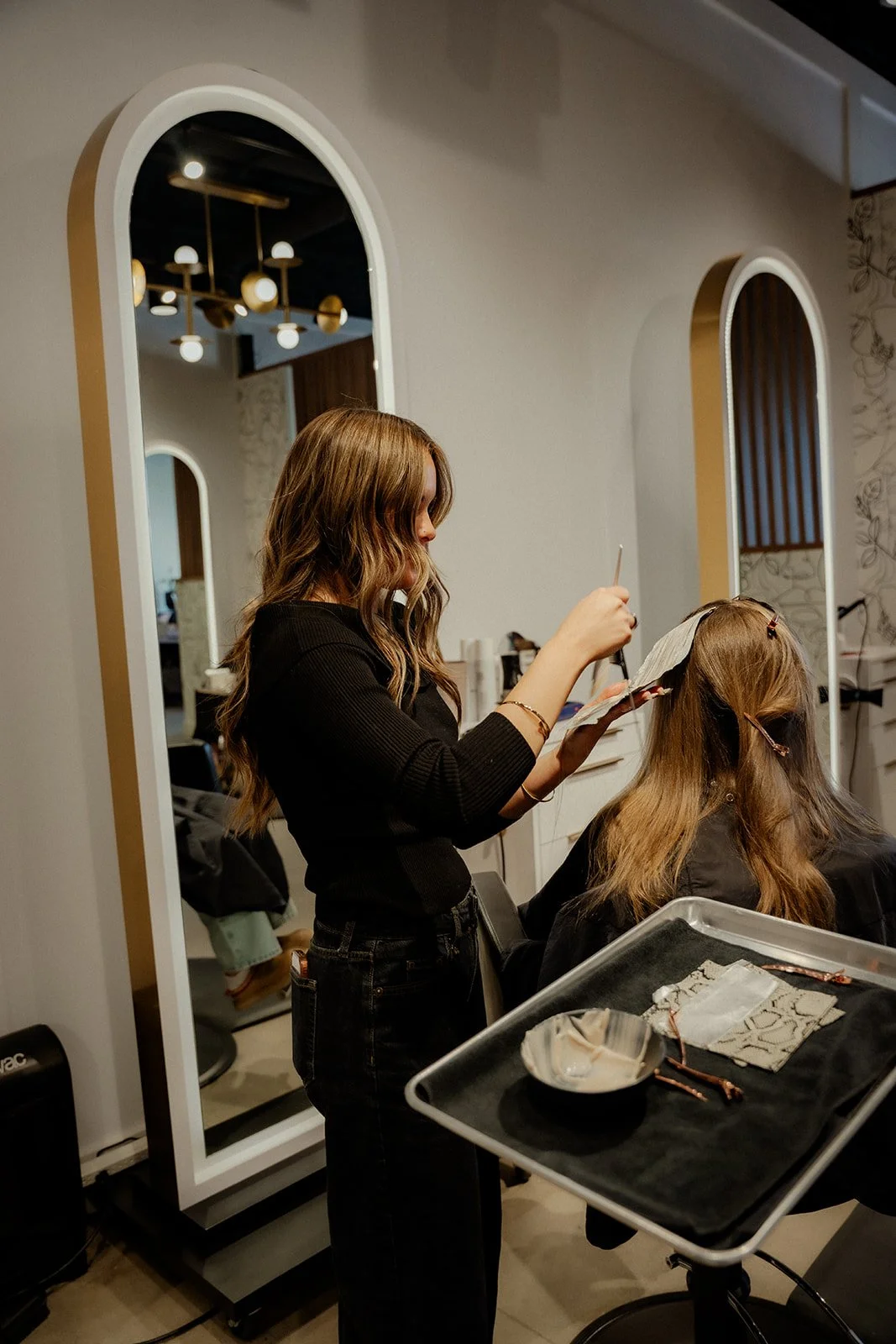 Stylist foiling custom hair color.