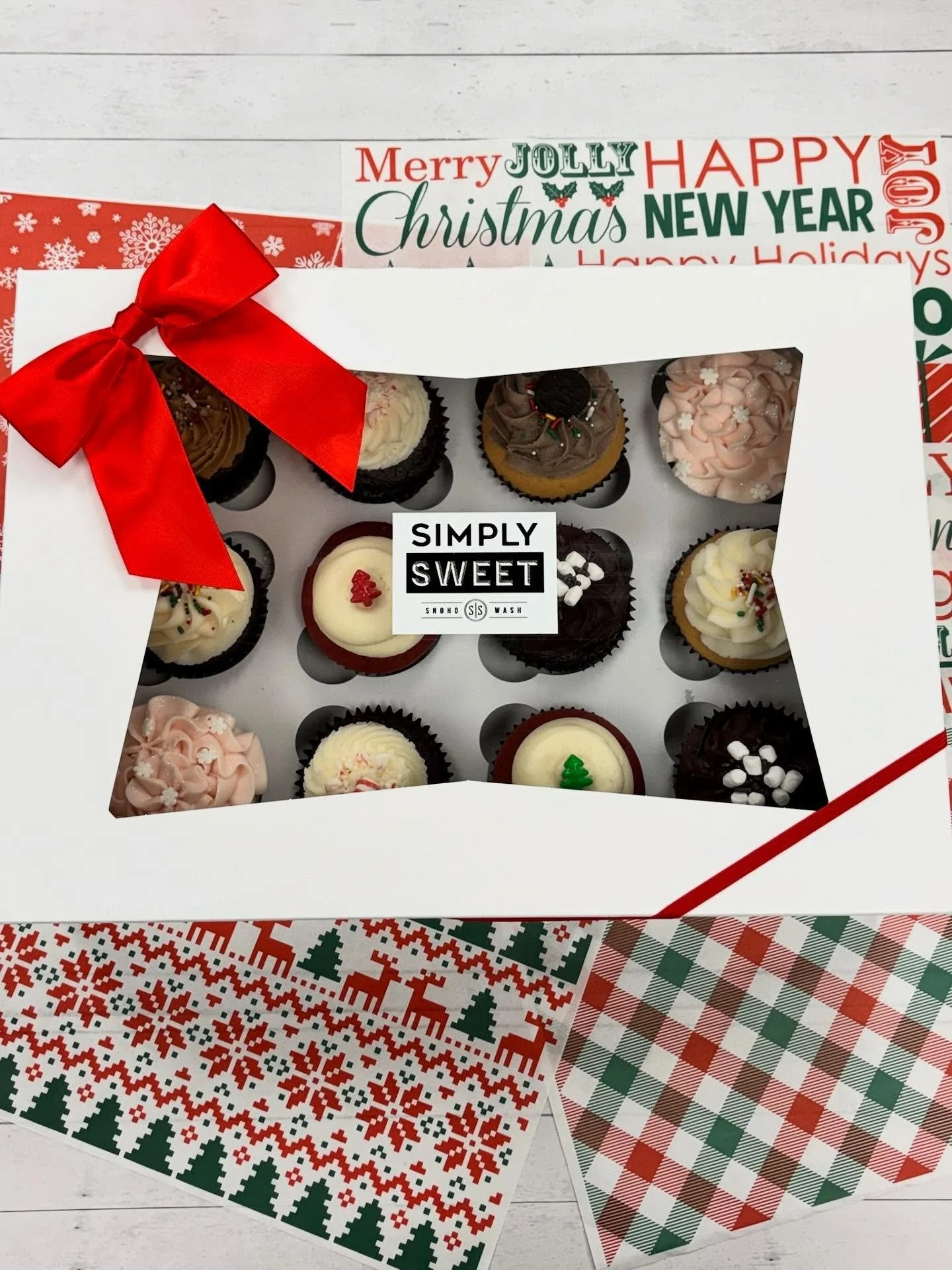 This variety cupcake dozen is decked out for the holidays! A perfect grab and go option to bring to a work event, holiday party, or gift to a teacher or friends! Each dozen comes with the following cupcakes:

2 Pink Champagne
2 Chocolate Buttercream

