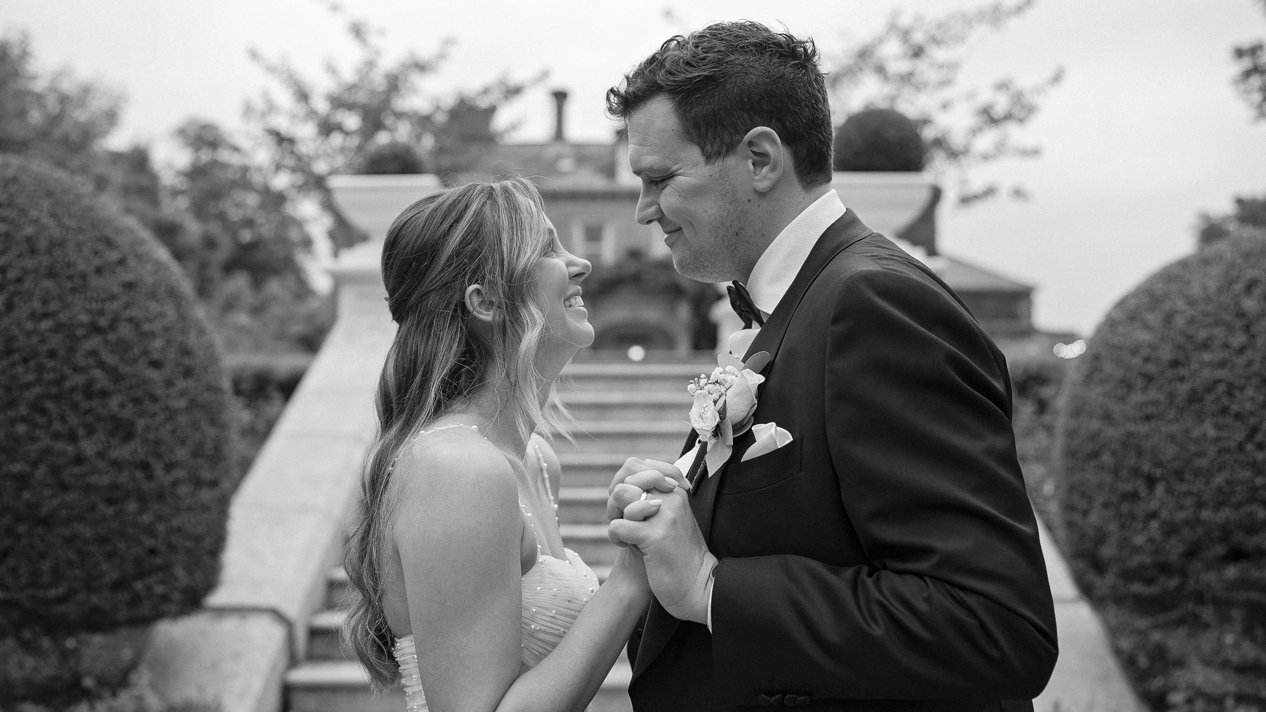 tinakilly-house-wedding-couple-garden-steps-black-and-white.jpg