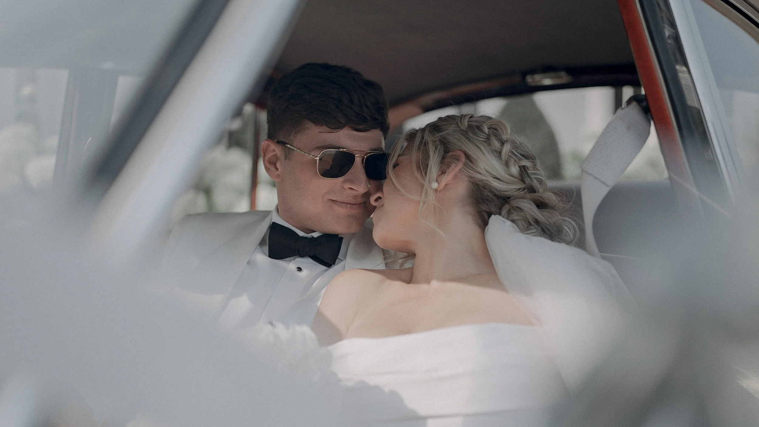 Taylor and Jack in the back of their classic wedding car, Co. Kildare
