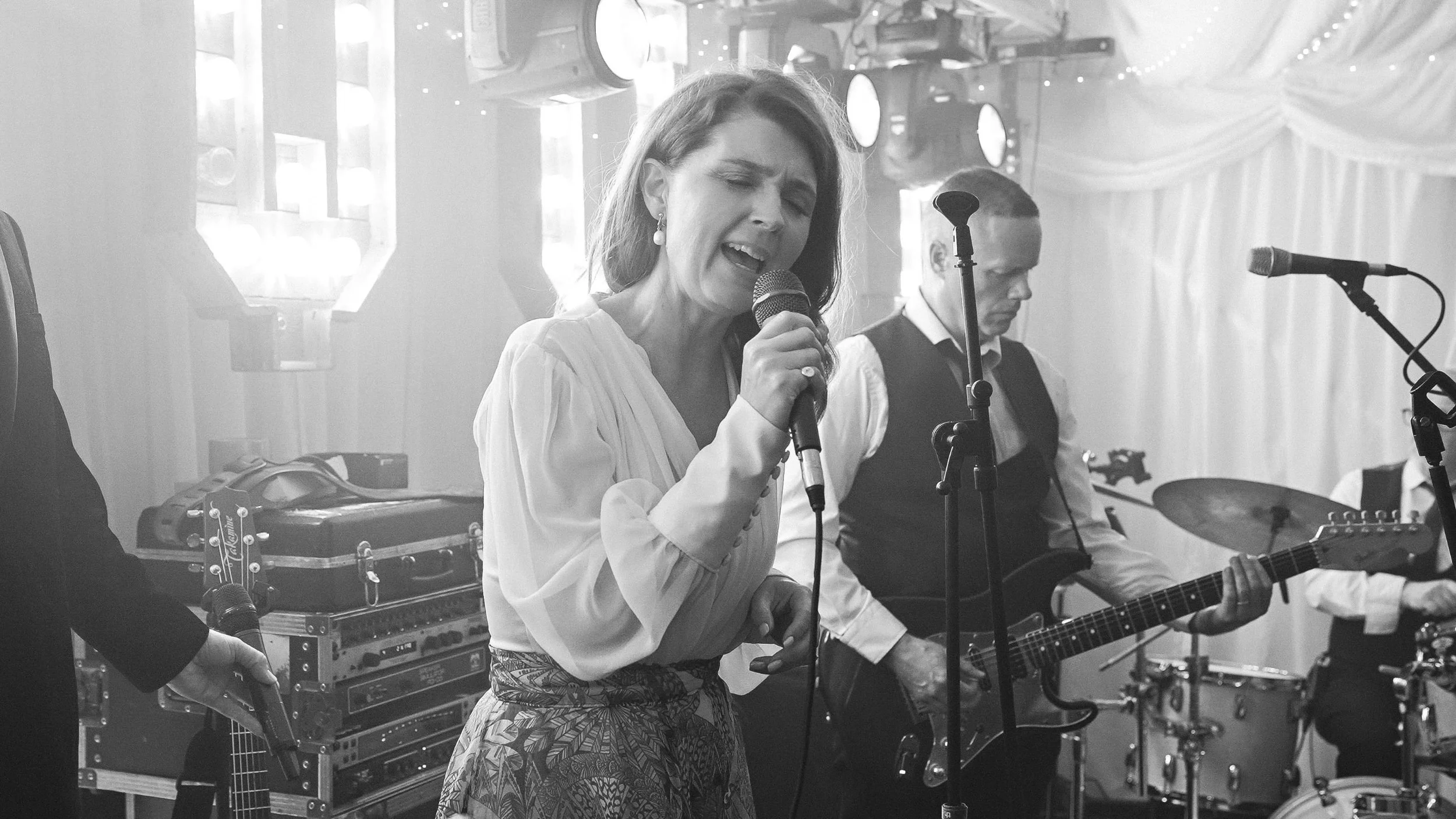 Live wedding band singer performing in the marquee, Curragh wedding in Kildare