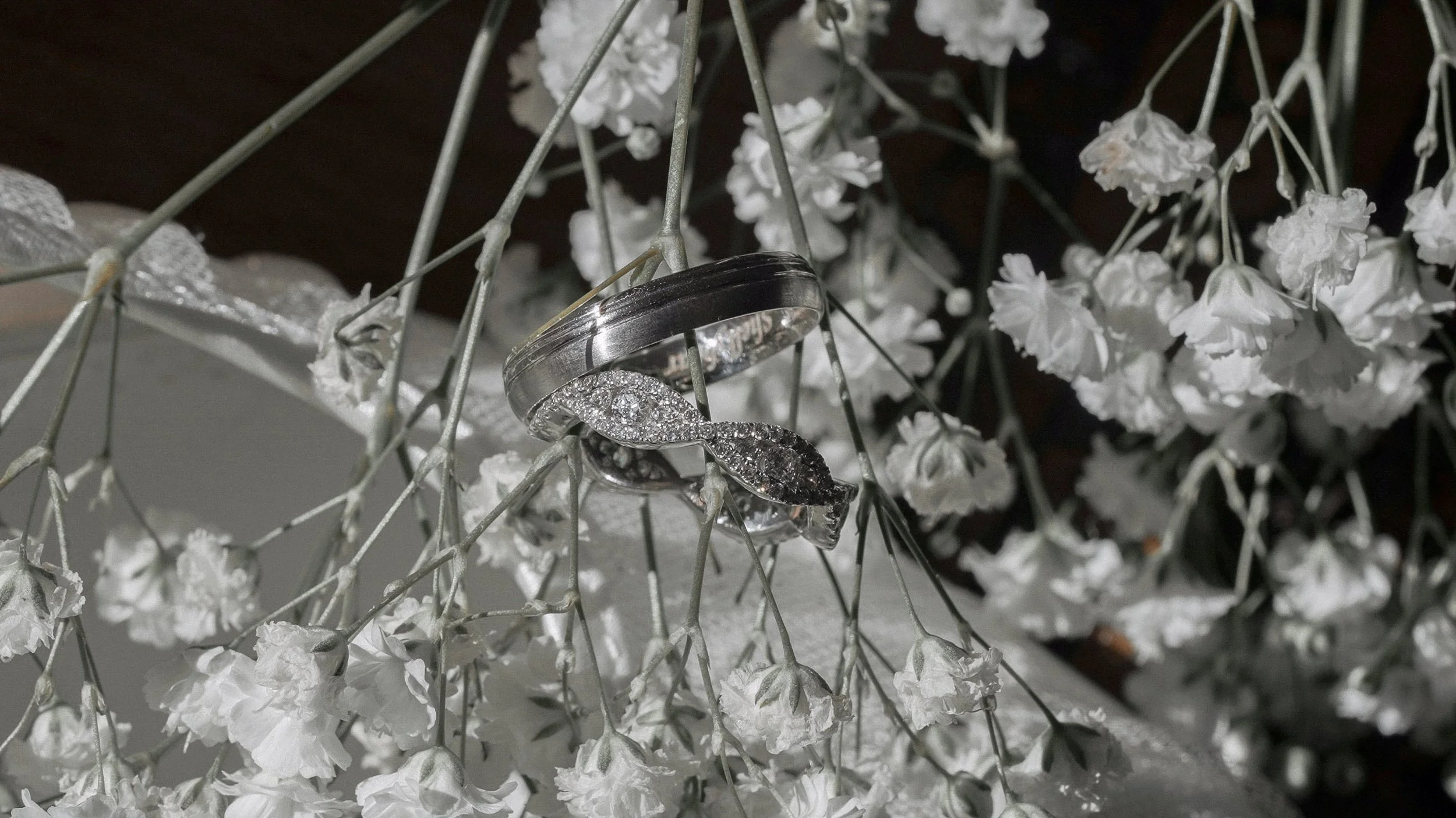 Wedding rings resting in white gypsophila before a Clonwilliam House wedding, Co. Wicklow