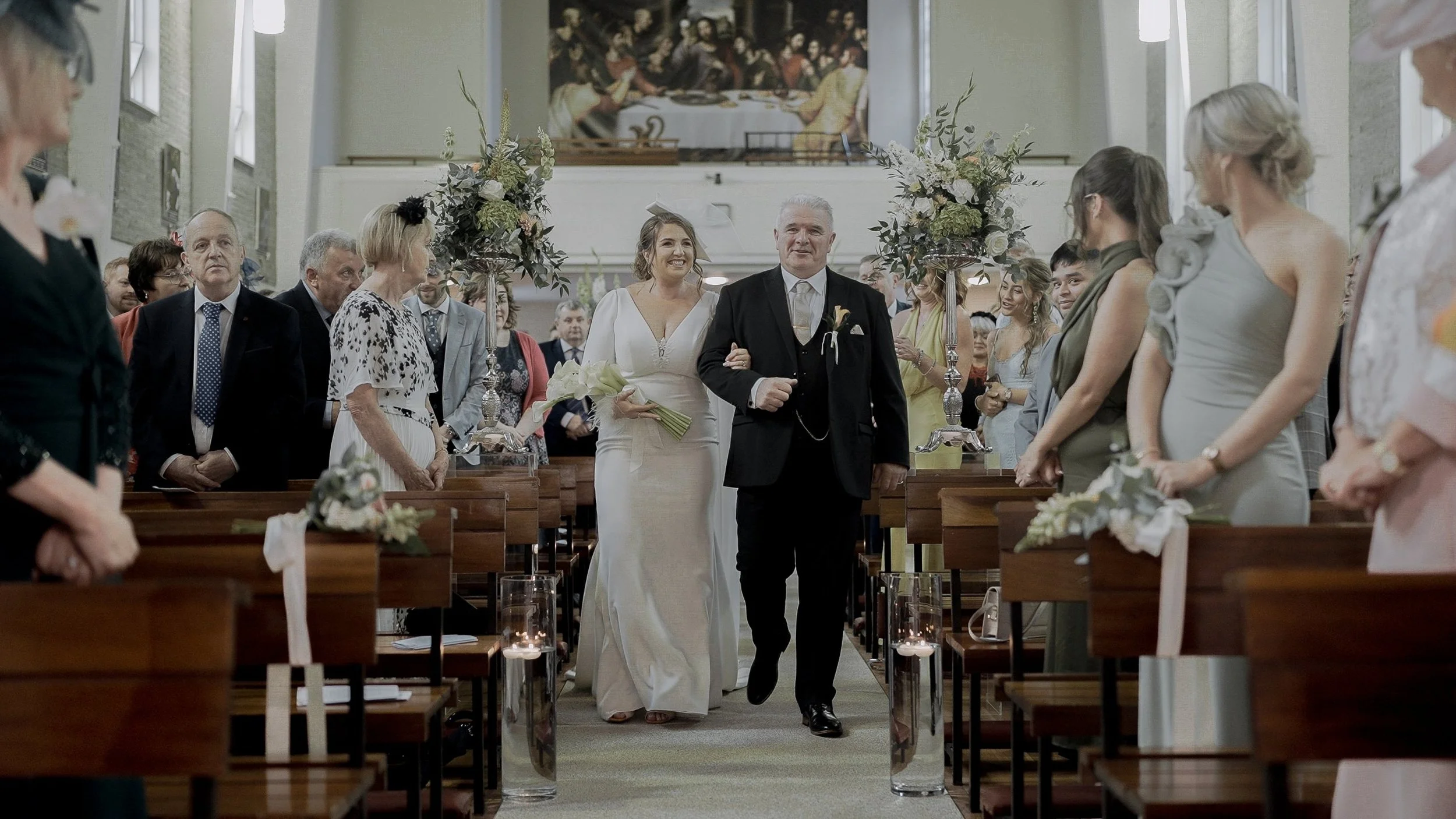 Bride walking down the aisle with her father at Christ the King Church, Cooleragh, Co. Kildare