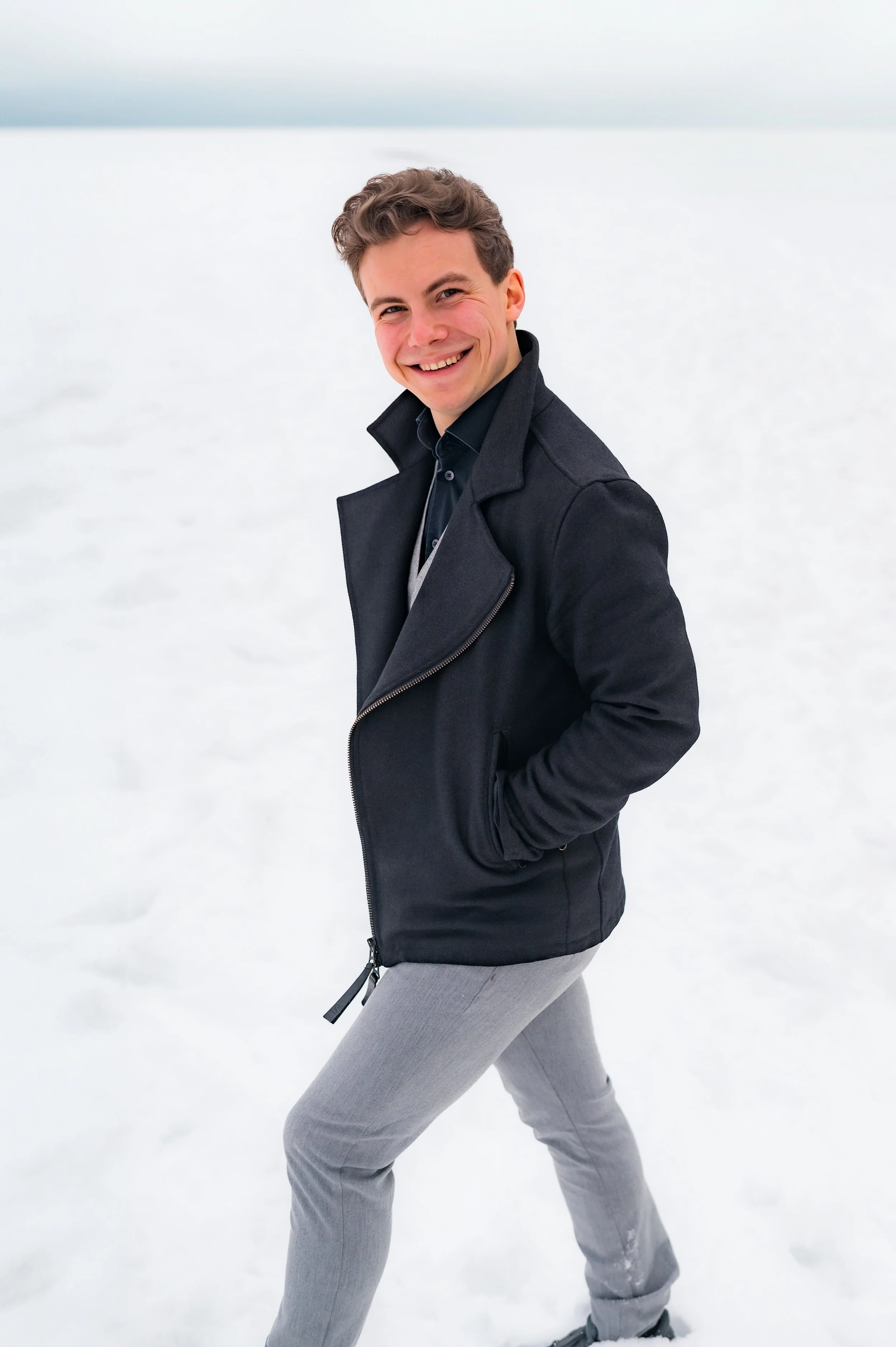 young man walking on the snow