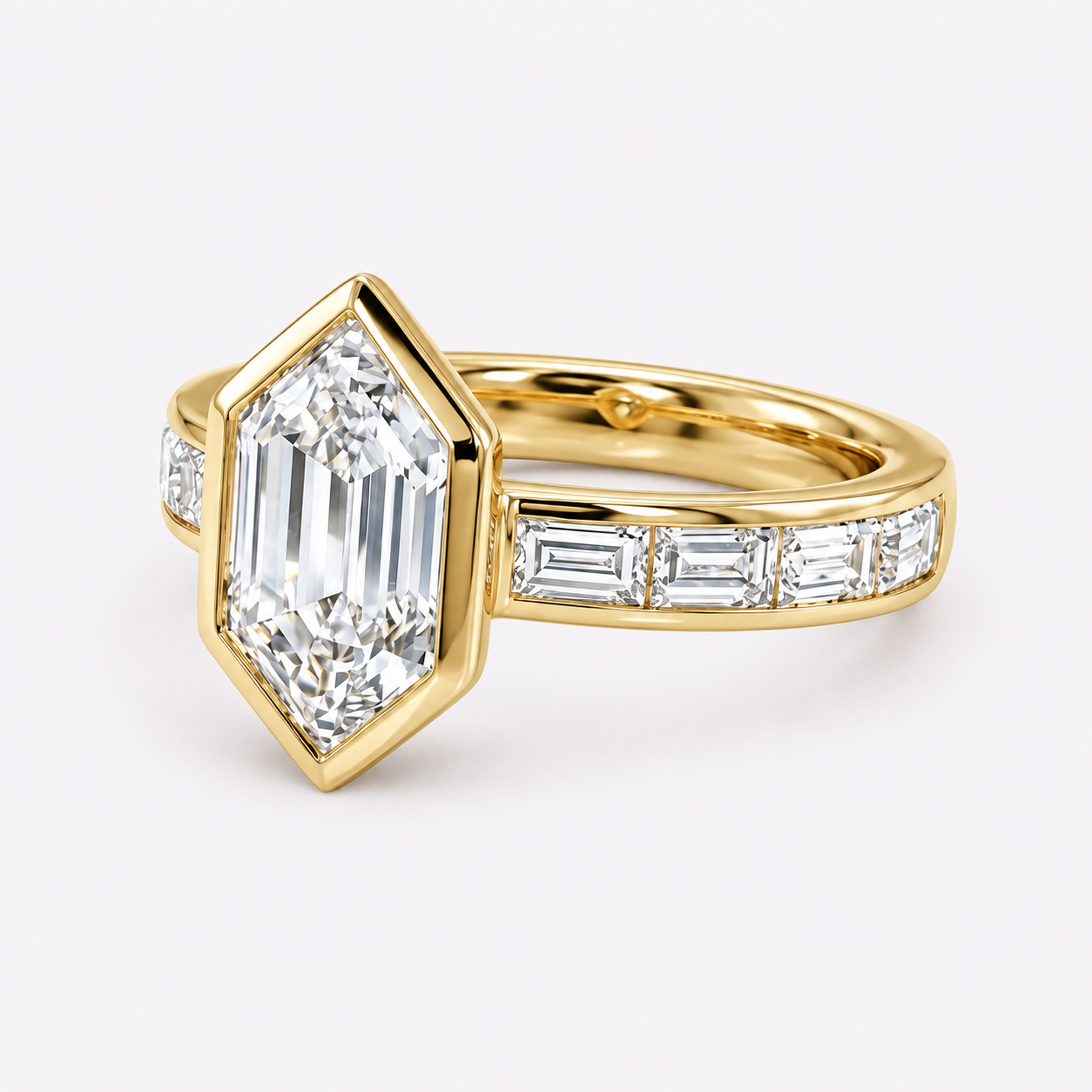 Gold ring with a large marquise-cut diamond and channel-set baguette diamonds on the band.