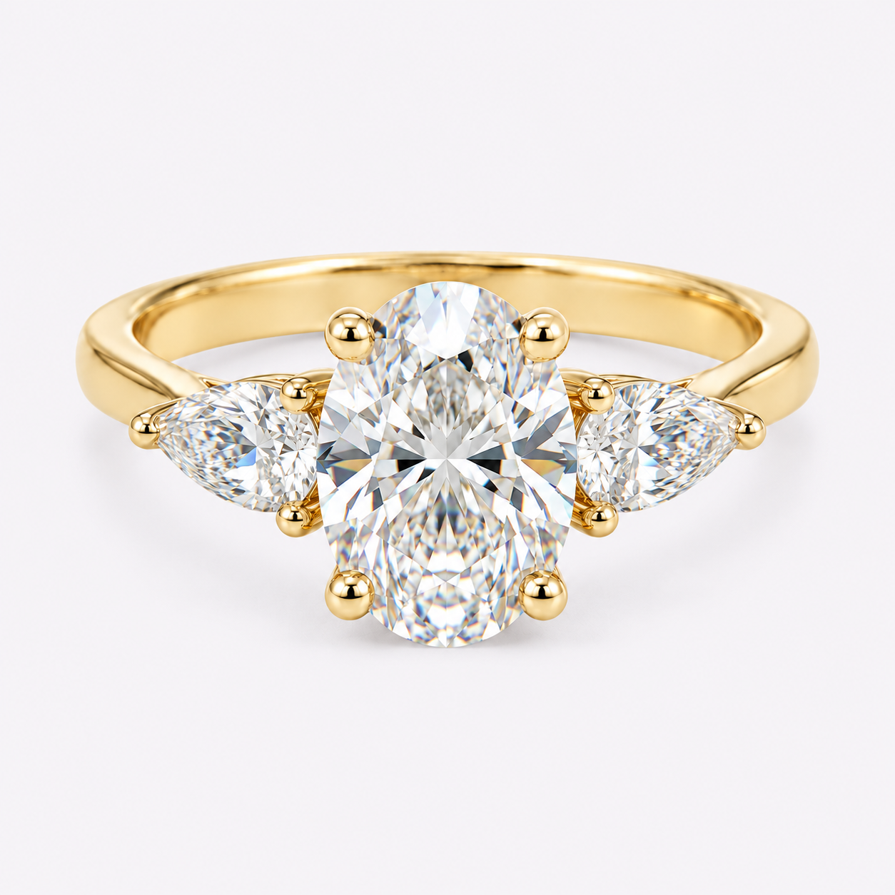 Gold ring with large oval diamond and smaller marquise-shaped diamonds