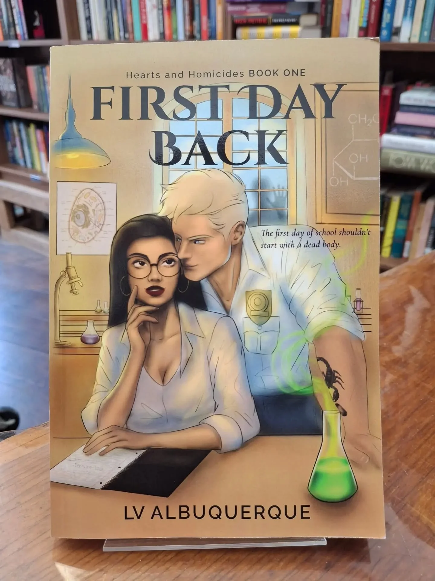 New on our Local Author shelf: FIRST DAY BACK, the debut novel from LV Albuquerque, is a humorous cozy mystery featuring amateur sleuths and a slow-burn romance.&nbsp;

When high school science teacher Bridget Cruz unlocks her classroom after summer 
