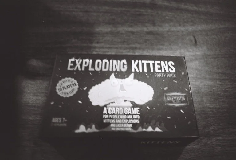 The card box for Exploding Kittens