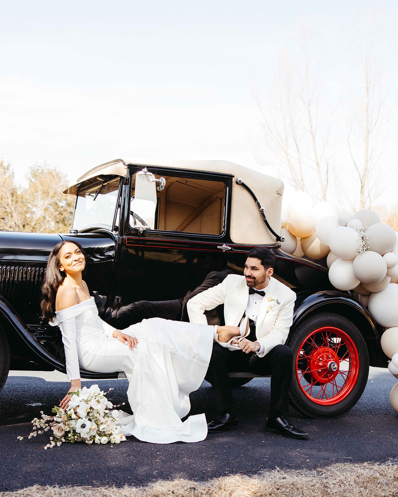 Bride and groom with vintage car The Venue at Shadow Rock Branson, Mo