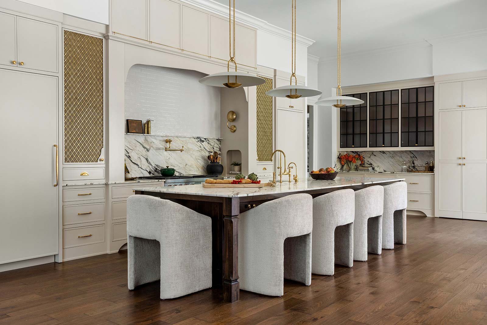 Upscale Indian Springs kitchen remodel showcasing custom island seating and elegant arched cabinetry design.