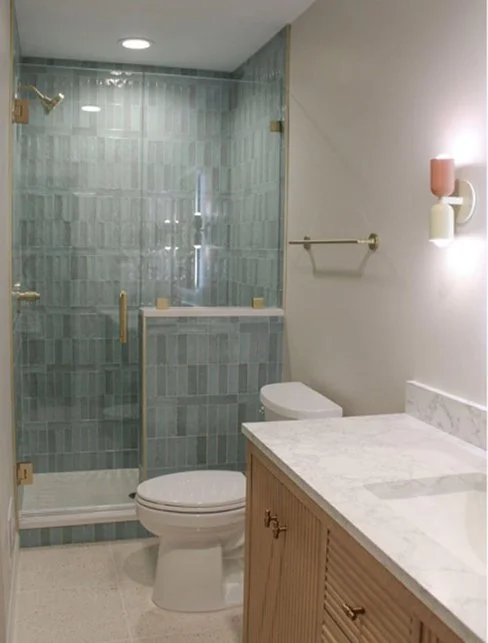 Shower tile installed in a vertical pattern
