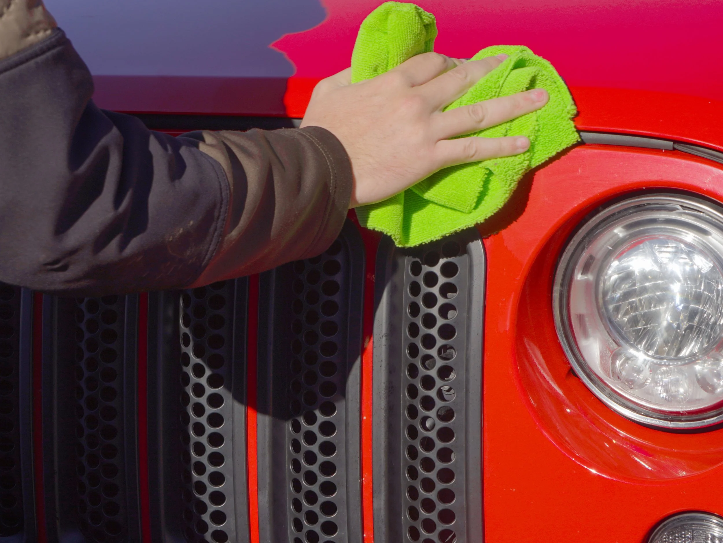 cleaning bugs off the front of a car