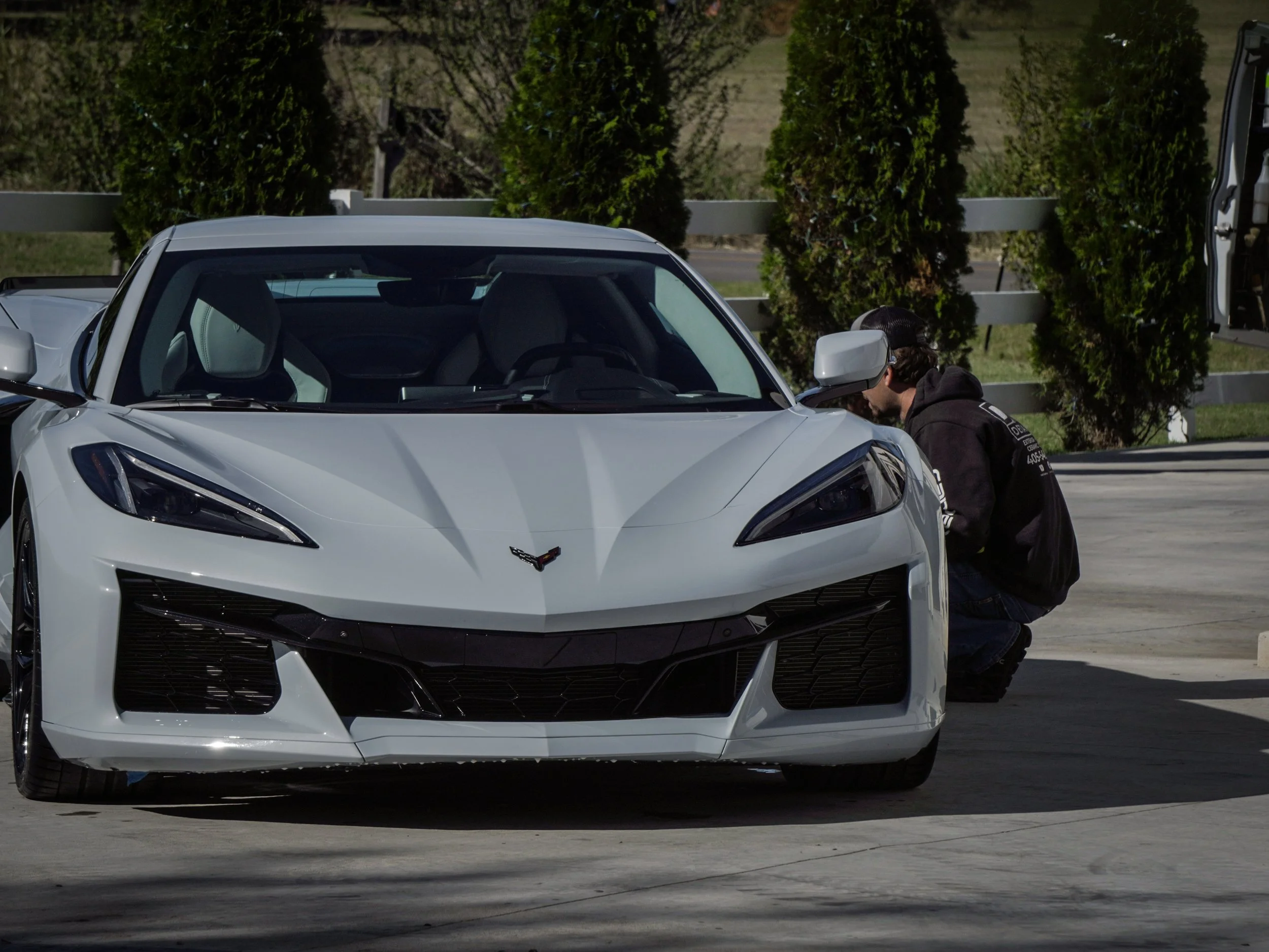 Finishing touches on a corvette at a customer's house