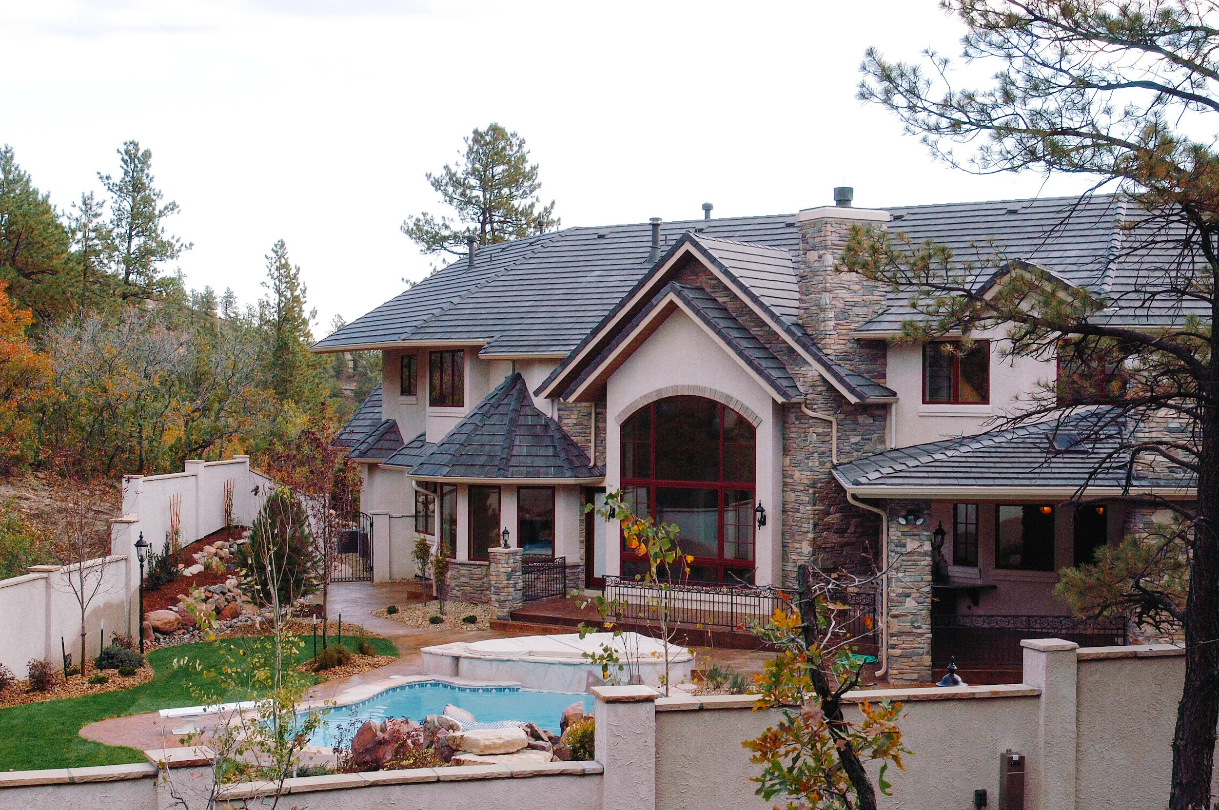 Colorado Springs transitional lodge style home in autumn.
