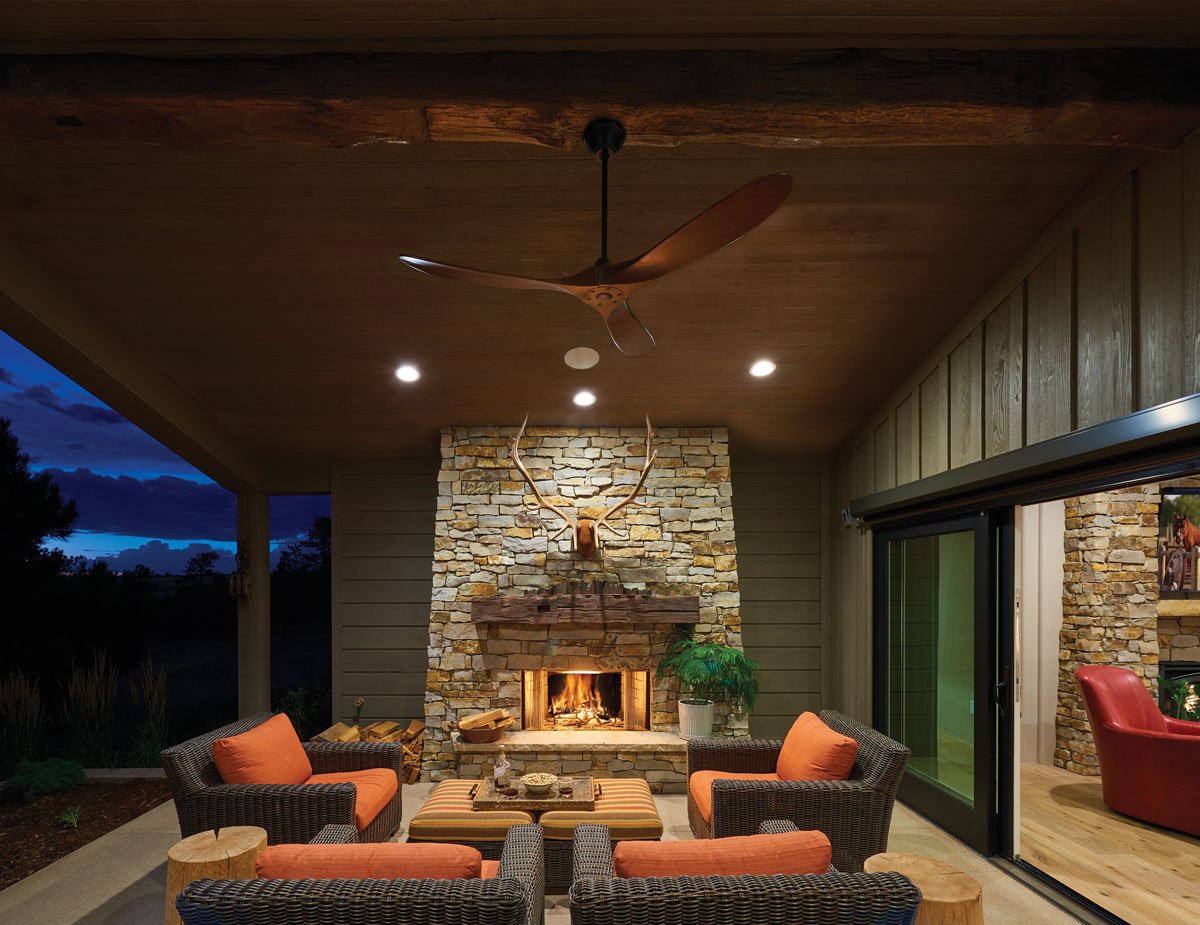  Outdoor living is vital to the Colorado ranch concept with spaces designed for year-round enjoyment, such as outdoor kitchens, covered and heated patios, and wood-burning fireplaces   (From    Colorado Springs Magazine    / Photo by Don Jones, Studi