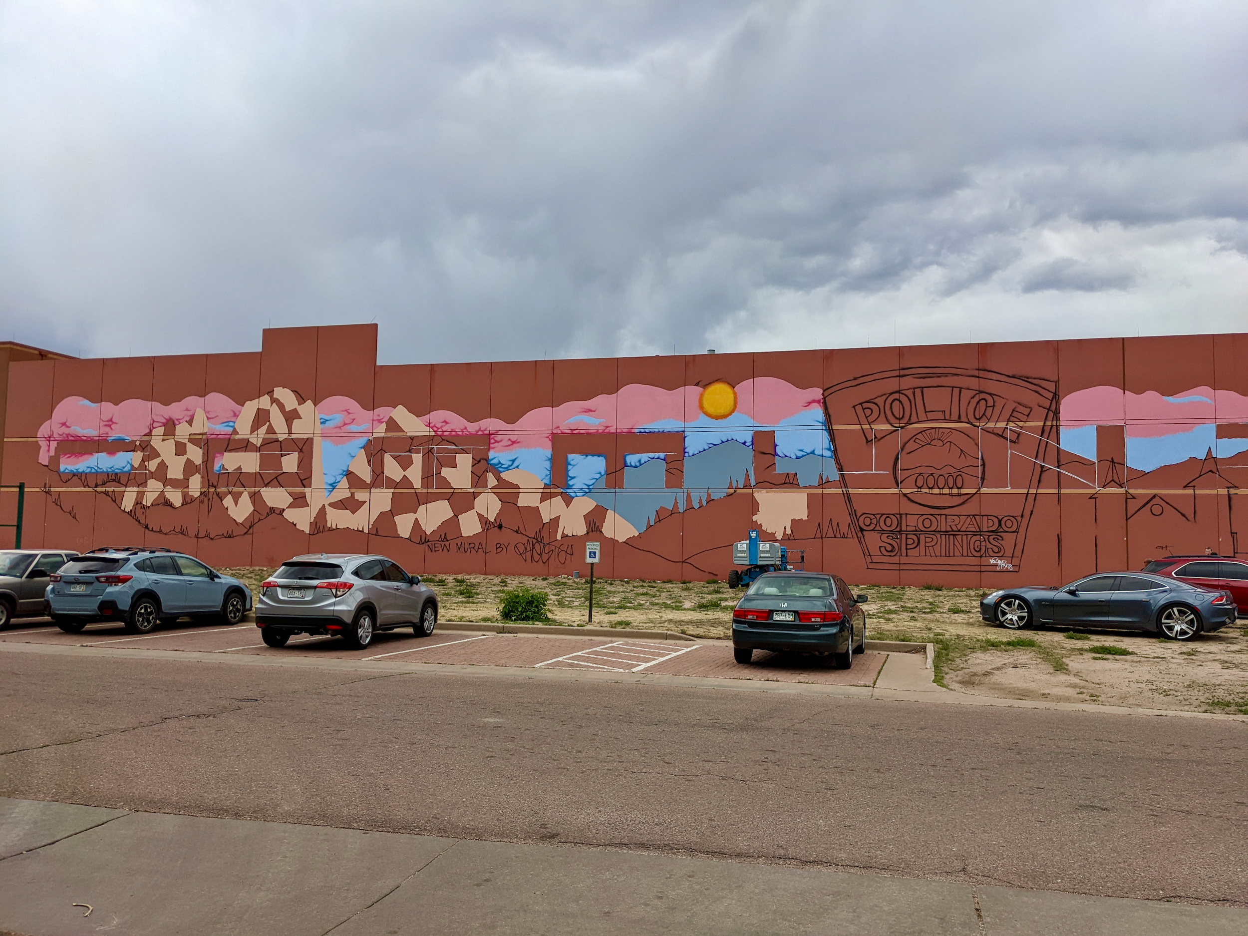  We’ve enjoyed having a front-row seat to see the mural come to life. The artist worked from a lift he could operate himself. 