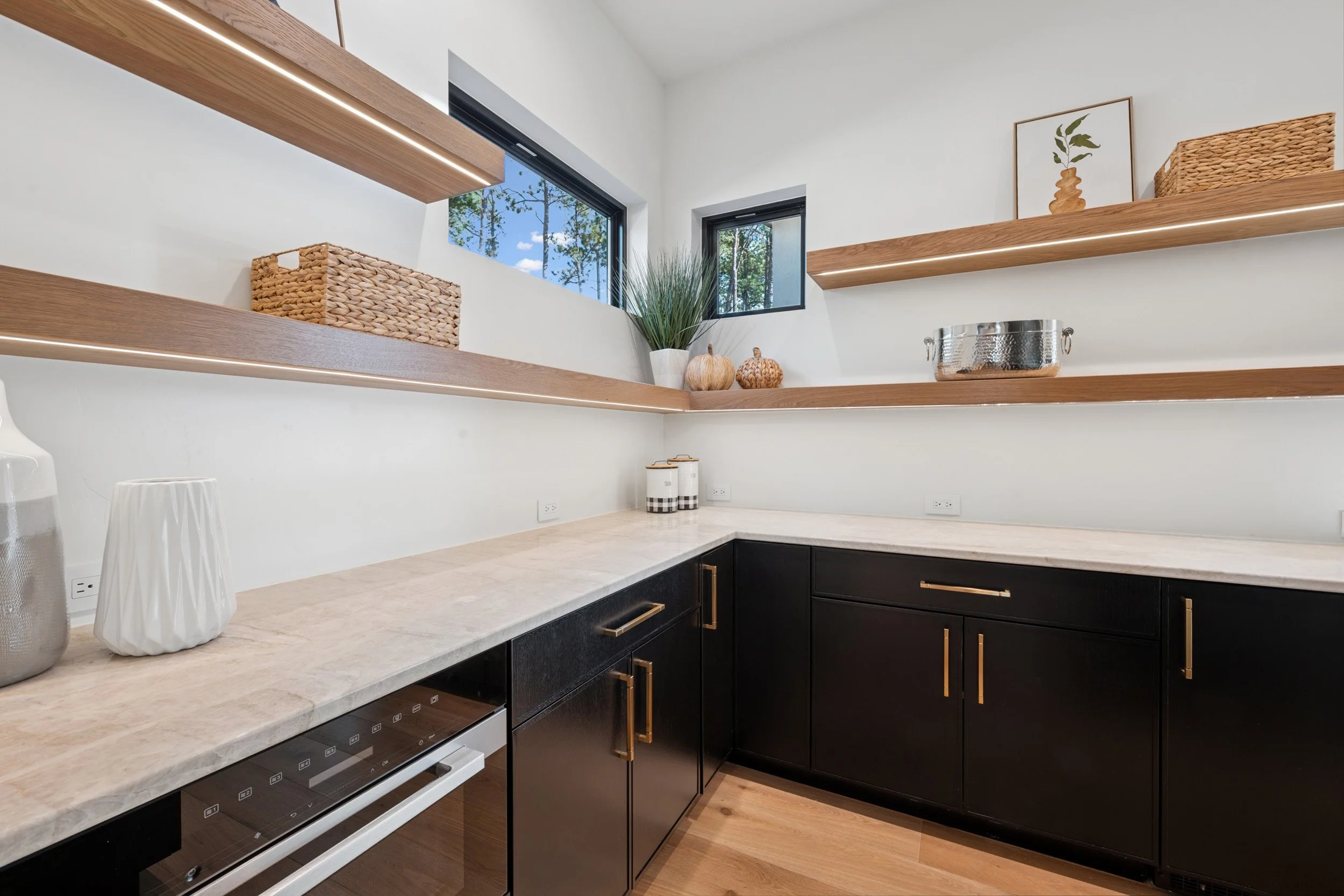 Messy kitchen or butler's pantry in custom home. 