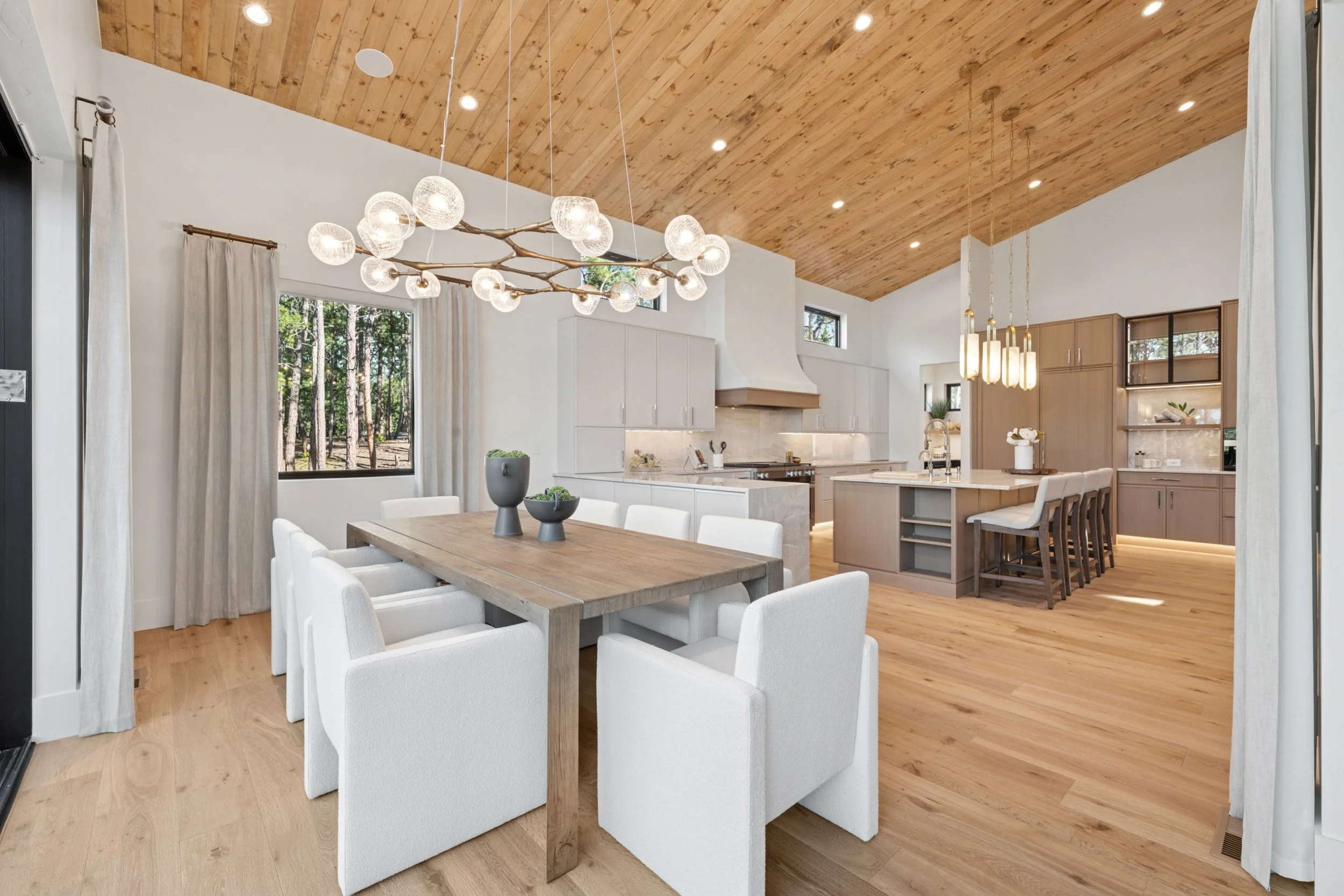 Dining room in warm contemporary custom home.