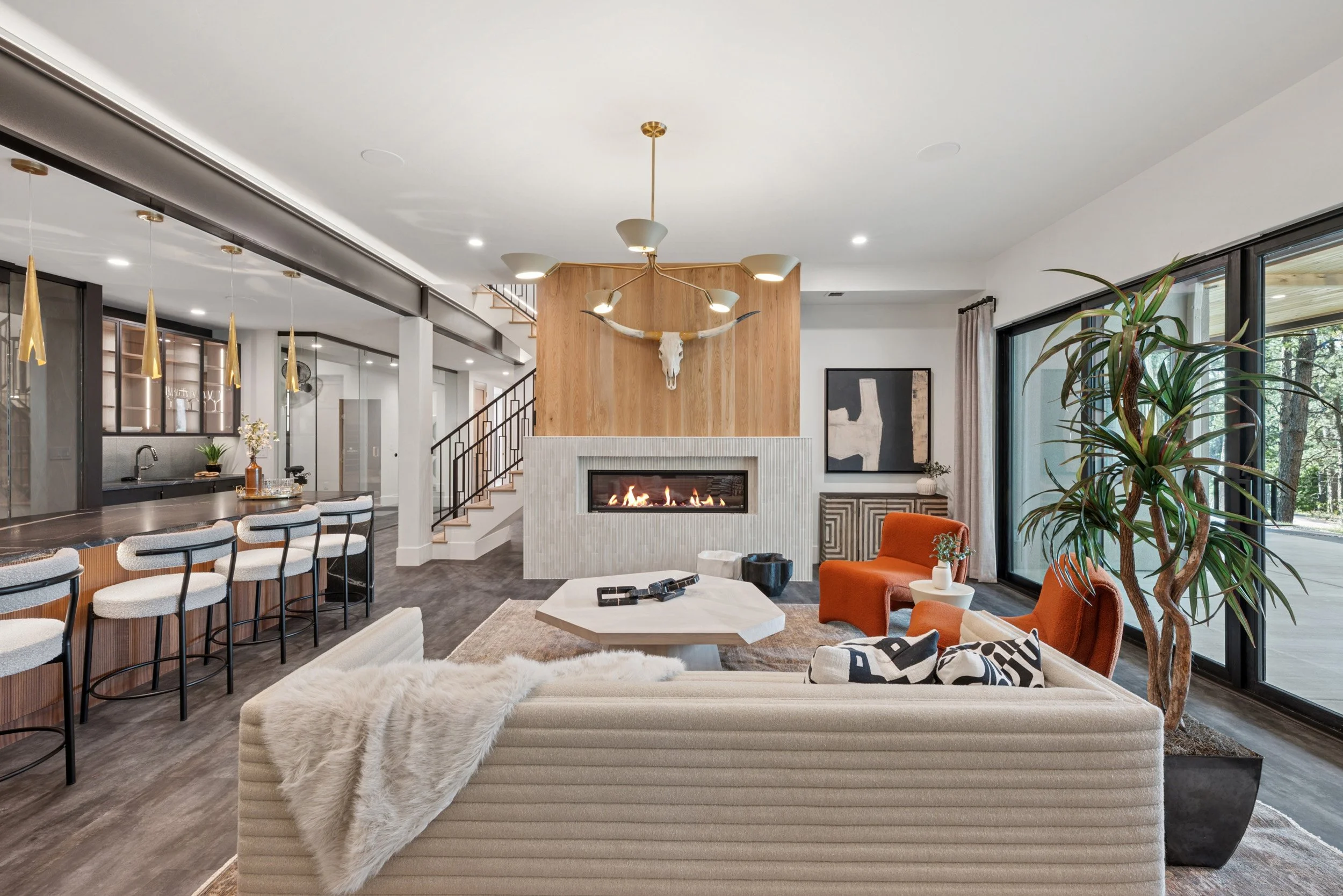 Contemporary cozy rec room in hillside walkout home.