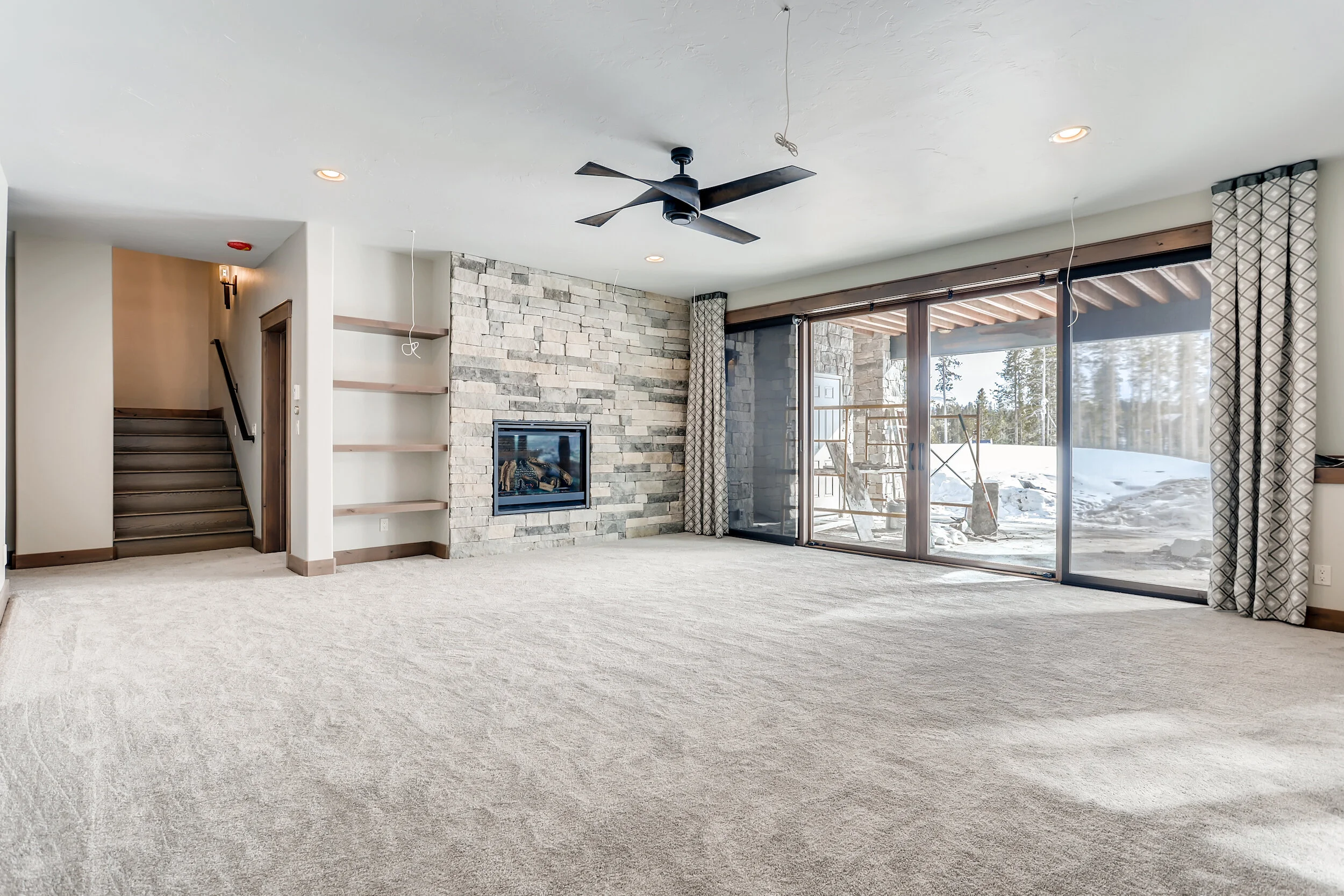 Hillside-Walkout_Mountain-Modern_Summit-County_Lower-Level-Family-Room_1.jpg