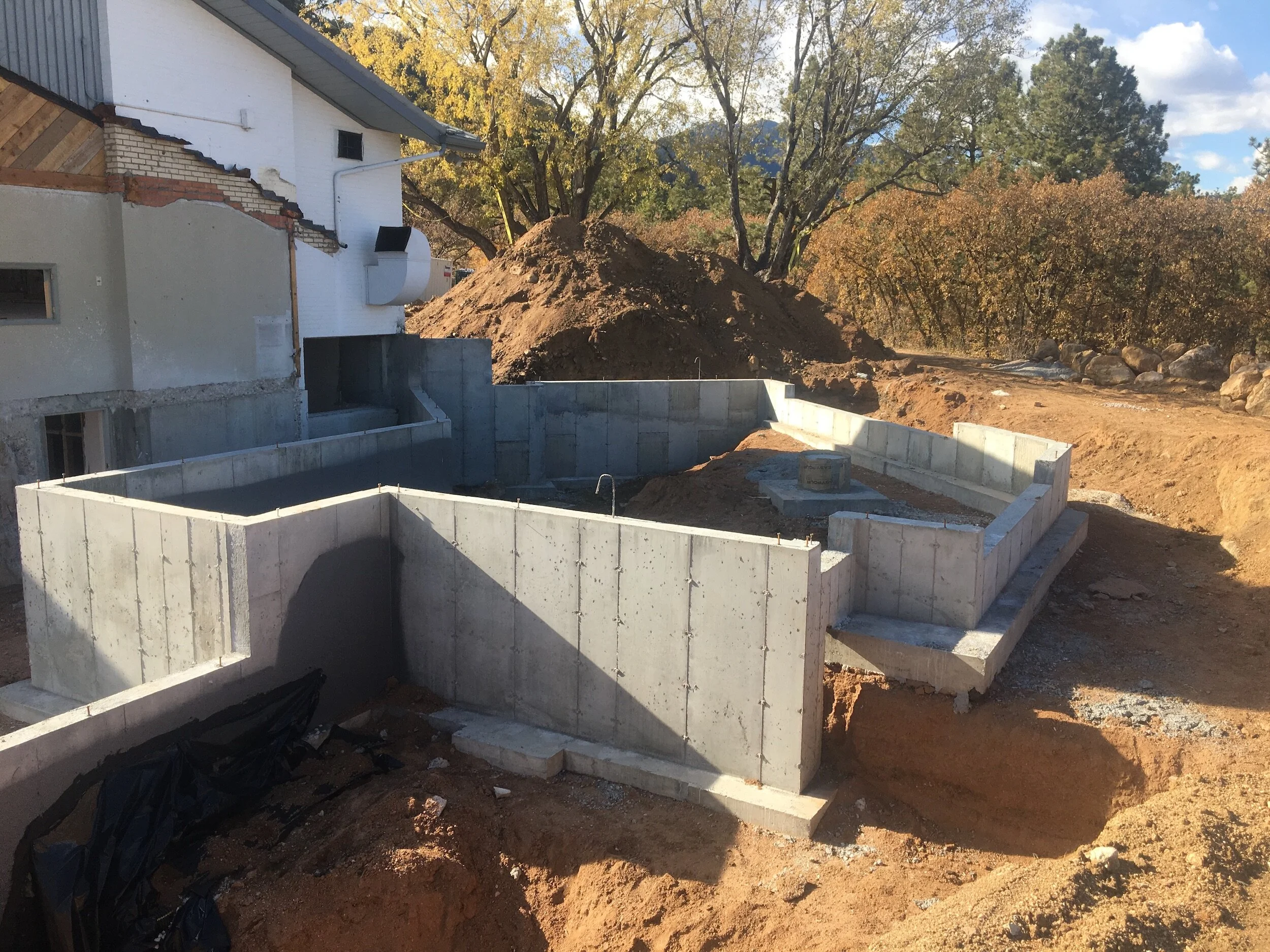 Concrete foundation under construction in Colorado Springs designed by LGA Studios.